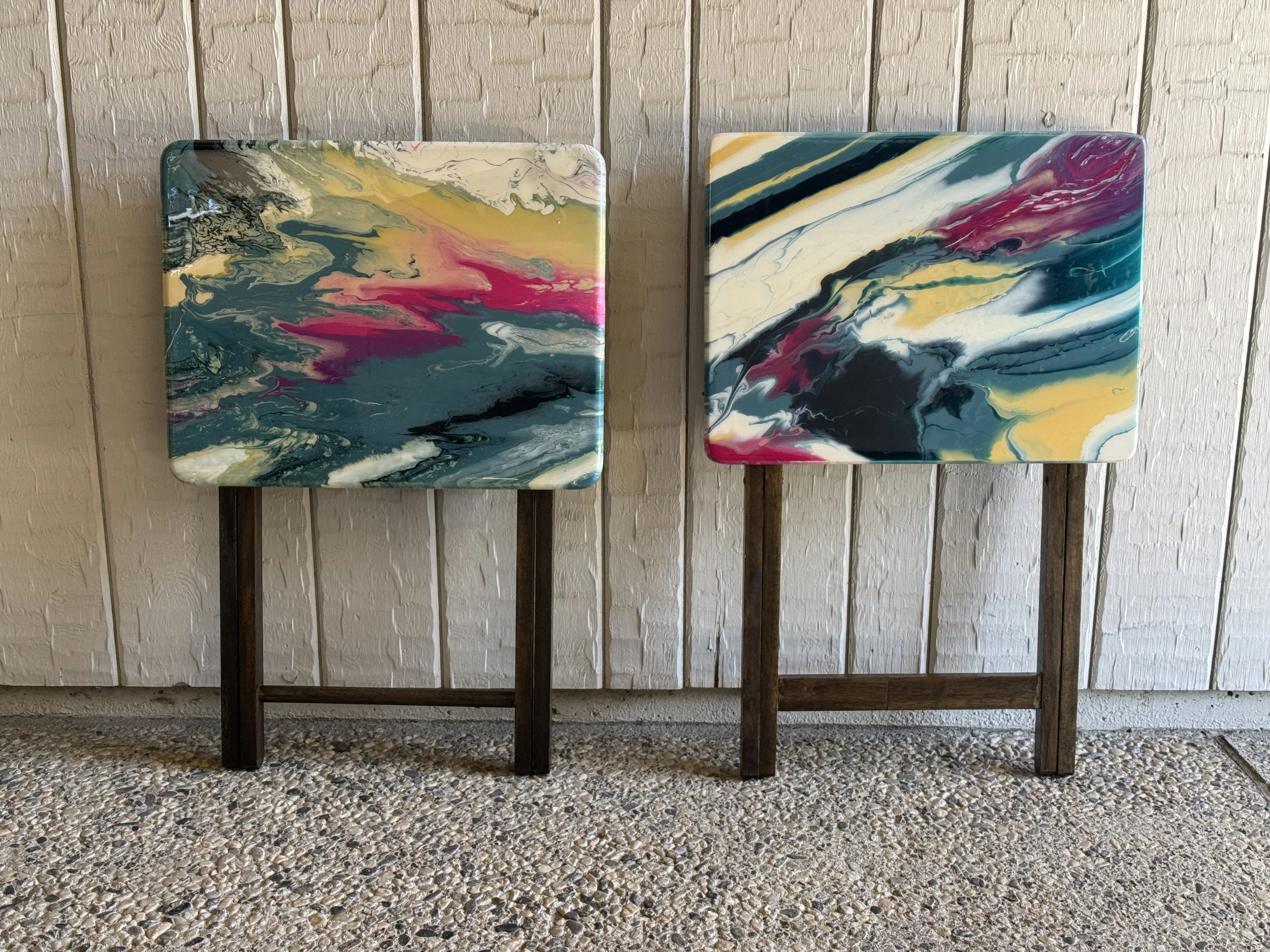 Wooden folding tables with acrylic flow design finished with protective resin topcoat.