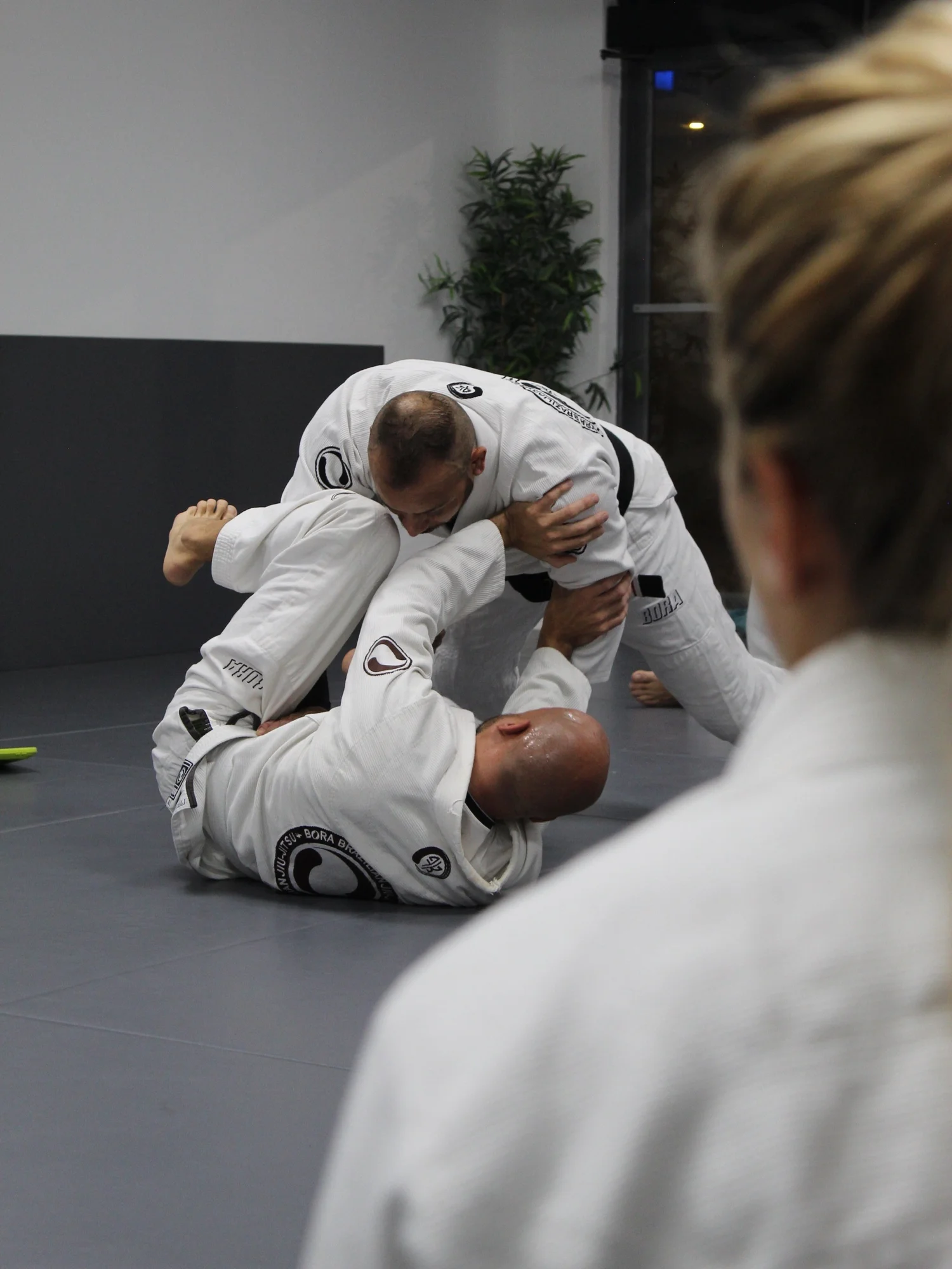 Students watching a Gi technique demonstration at Bora