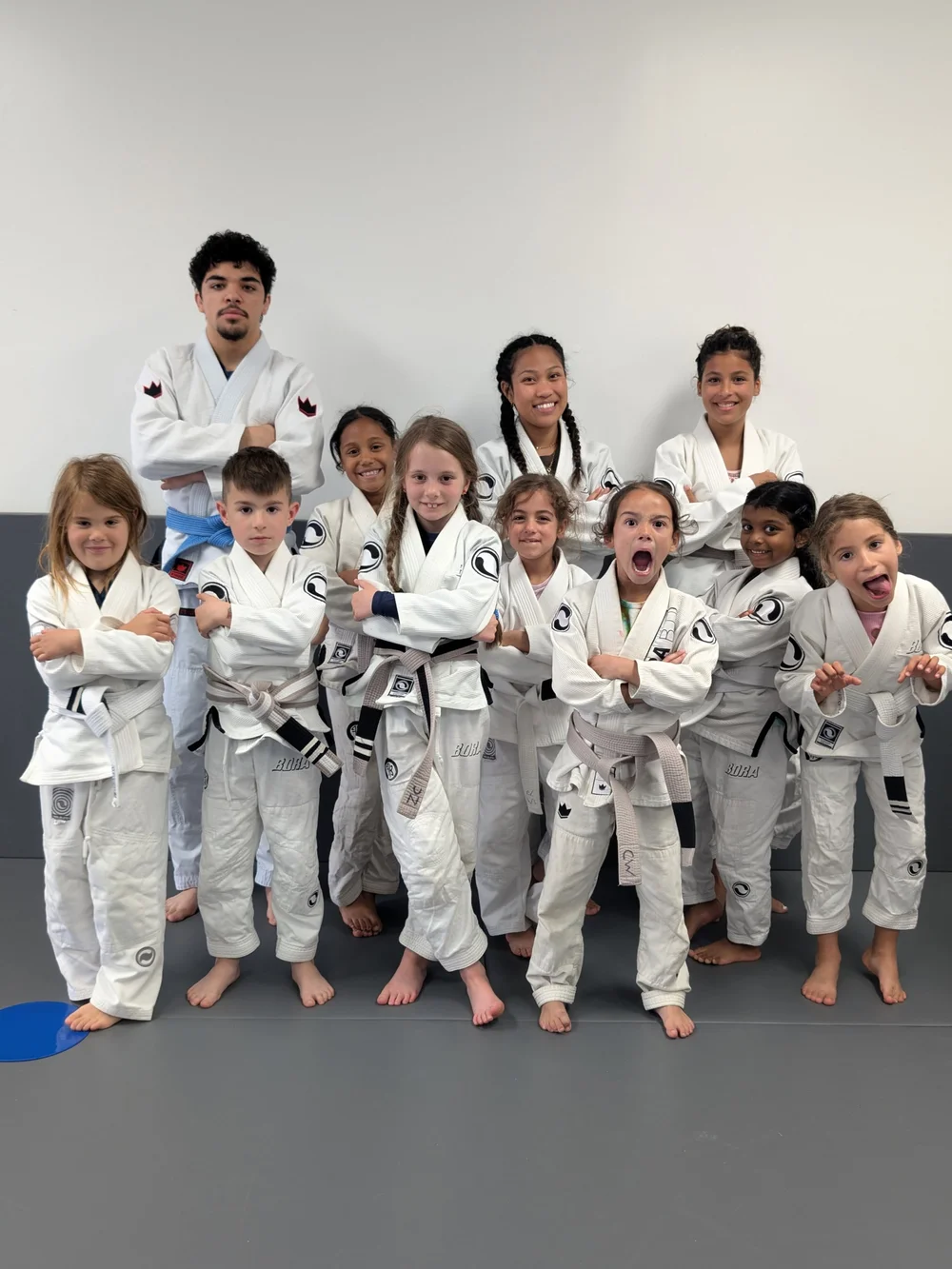 Kids learning Jiu-Jitsu at Bora.
