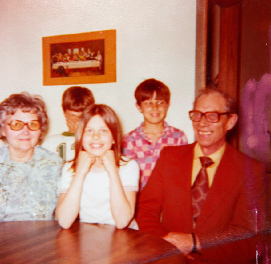 Family around the kitchen table 70s