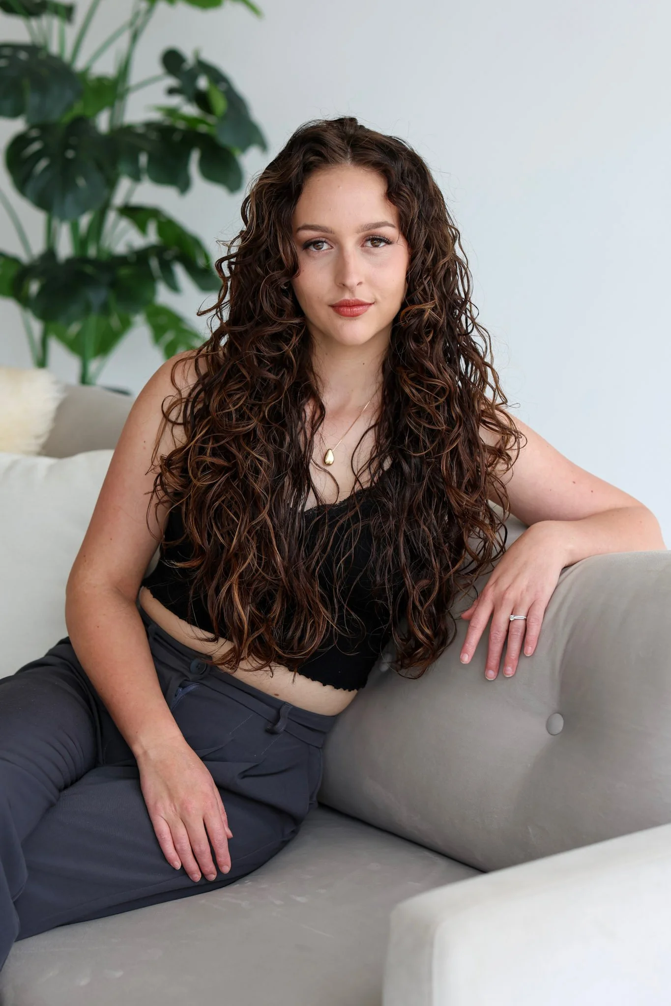 Hannah Taylor, Stylist at Glossed Collective. My favorite services are blonding and extensions.