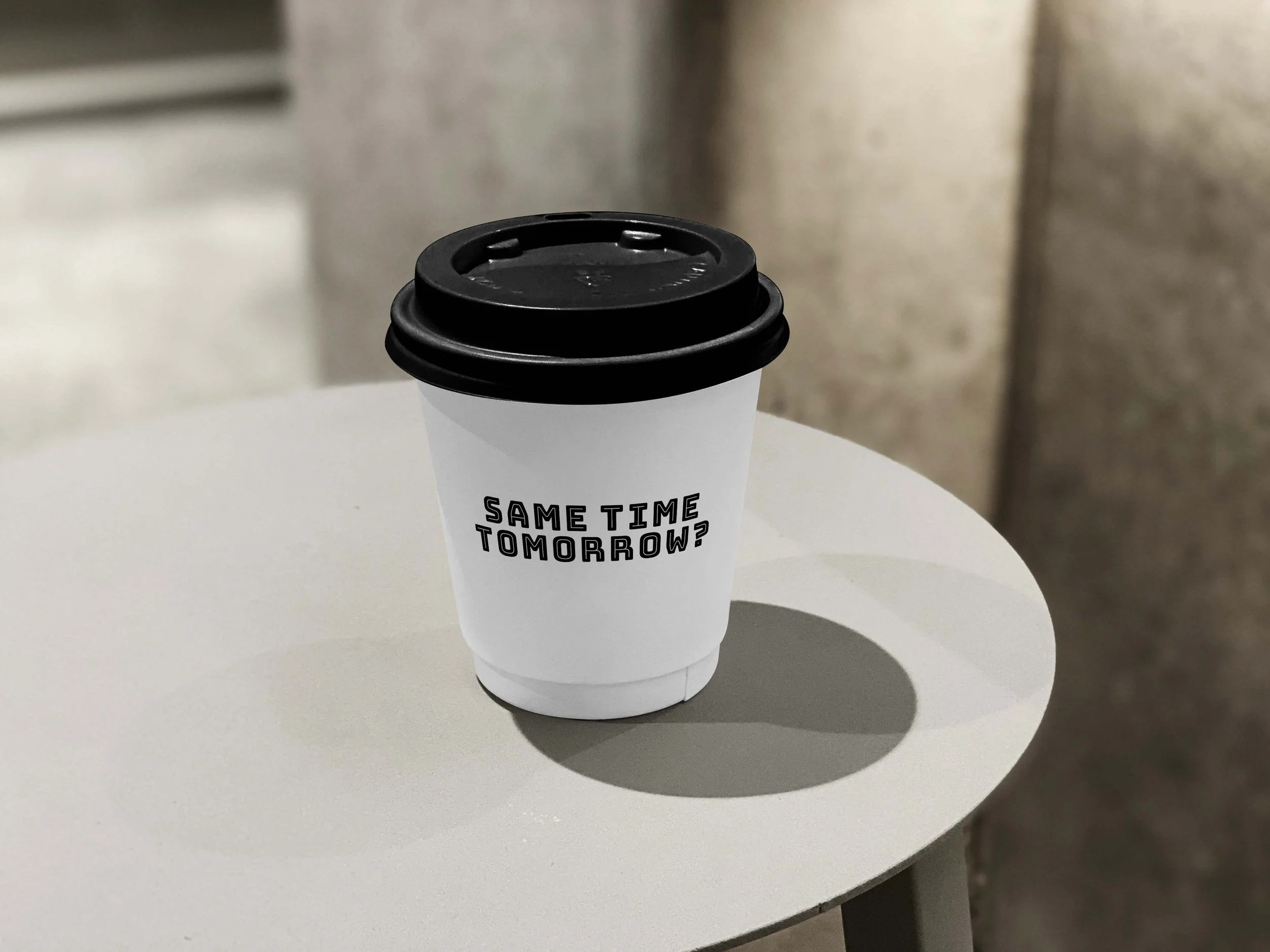 Small Coffee Cup on Table Mockup.jpg