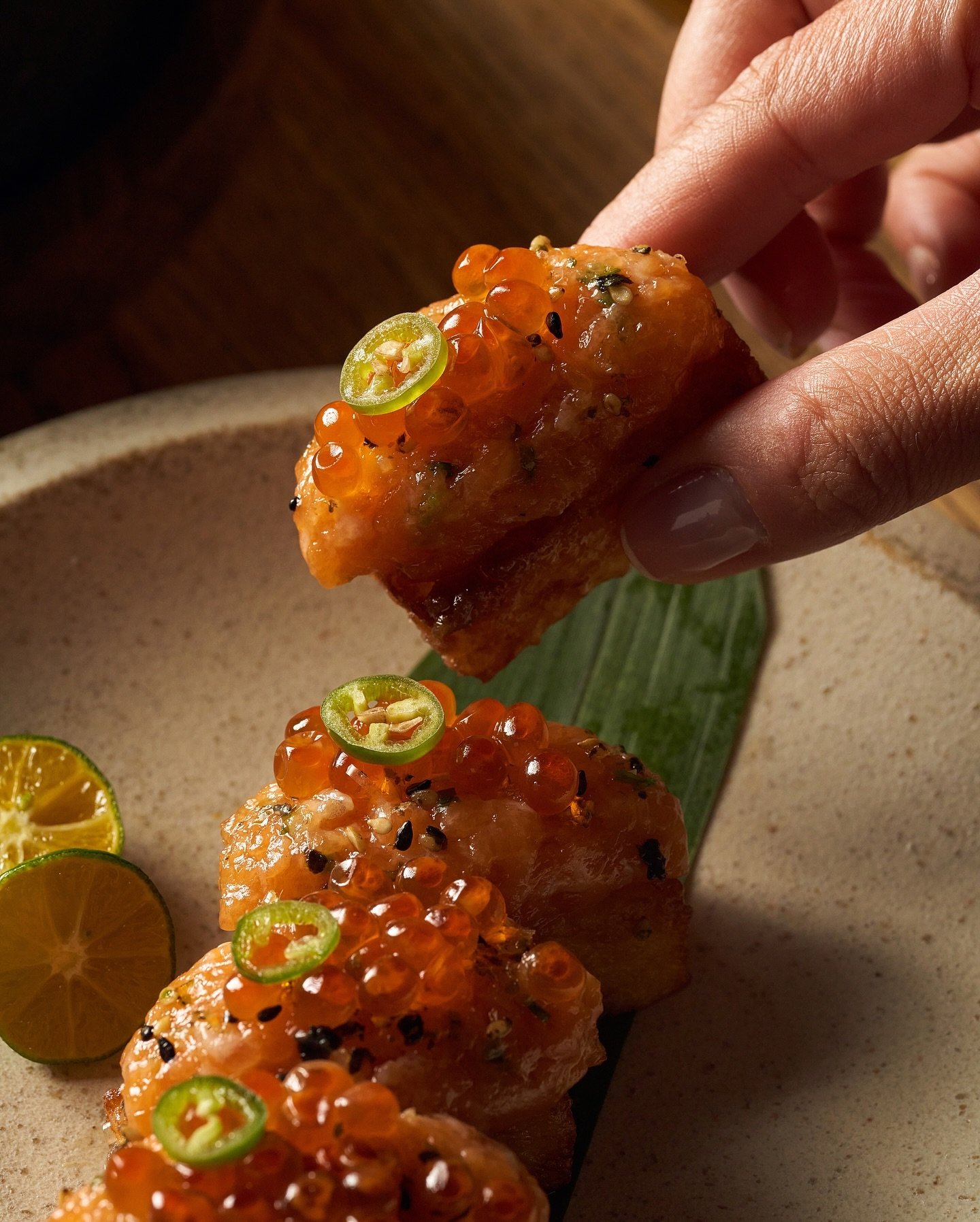 Begin your MILA experience with the perfect bite. Discover our Salmon Crispy Rice, made with fresh salmon, ikura, and katsuo furikake. #MILArestaurant