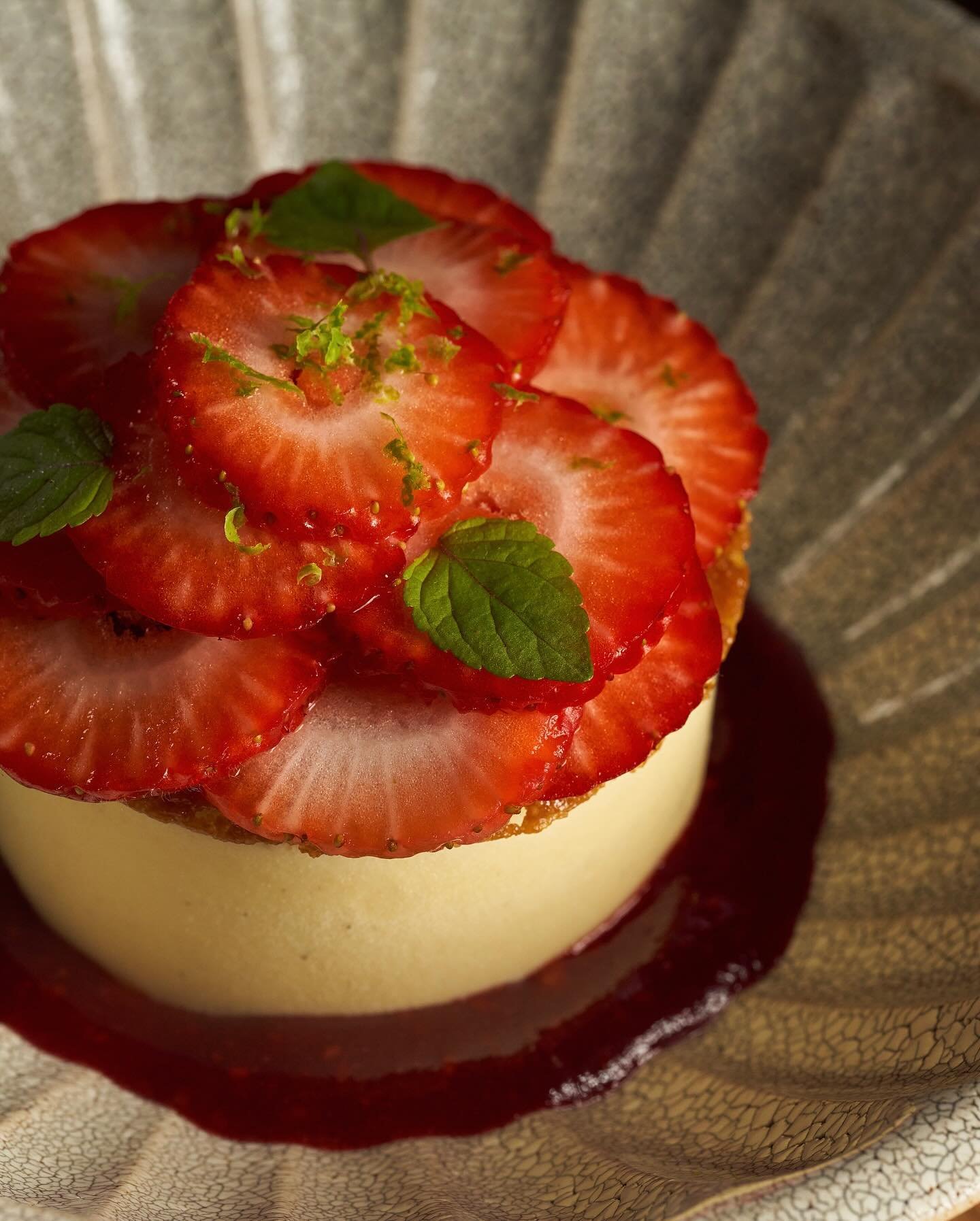 Indulge in the addictive flavors of MILA&rsquo;s Frozen Japanese Cheesecake, a creamy delight with a refreshing hint of yuzu, succulent strawberries, and a subtle almond finish. #MILArestaurants