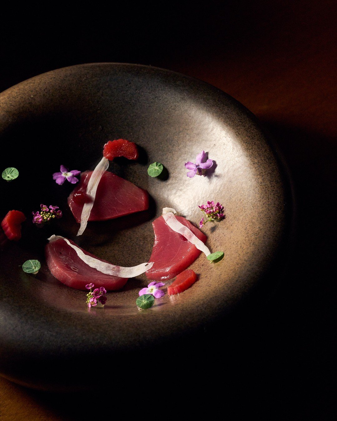 Discover the perfect balance of flavors unfolding in our Akami dish, paired with tart rhubarb and refreshing fennel. Reserve your experience at the link in bio. #MILAomakase
