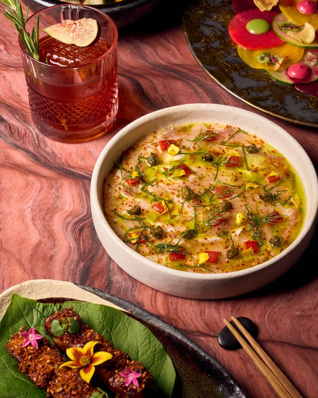 Crafted for connection, our MediterrAsian izakaya-inspired menu is meant to be shared. Discover new favorites like the Seabream Carpaccio, Rainbow Carpaccio, and Wild Fungi Dumplings, curated for indulgence.