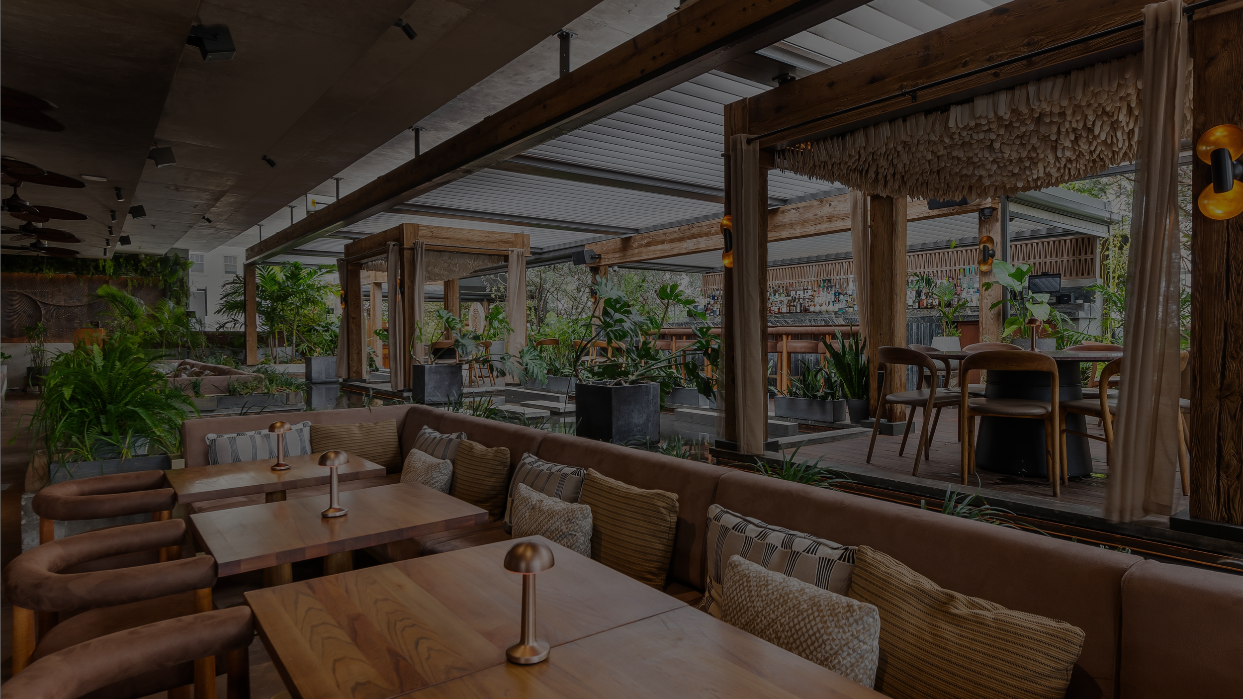 MILA rooftop restaurant dining setting.