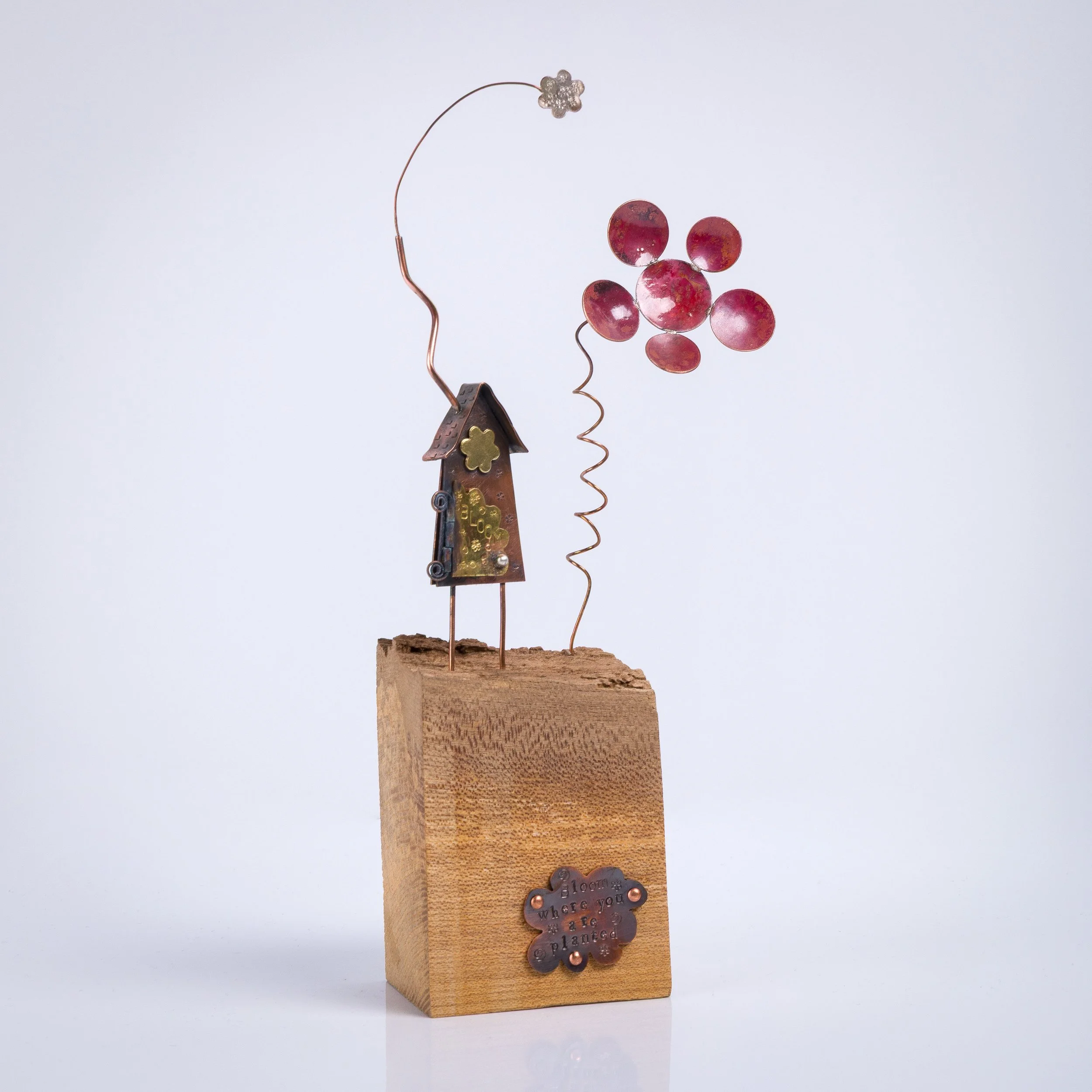 Sara Piper Heap – Bloom Where You Are Planted Sculpture