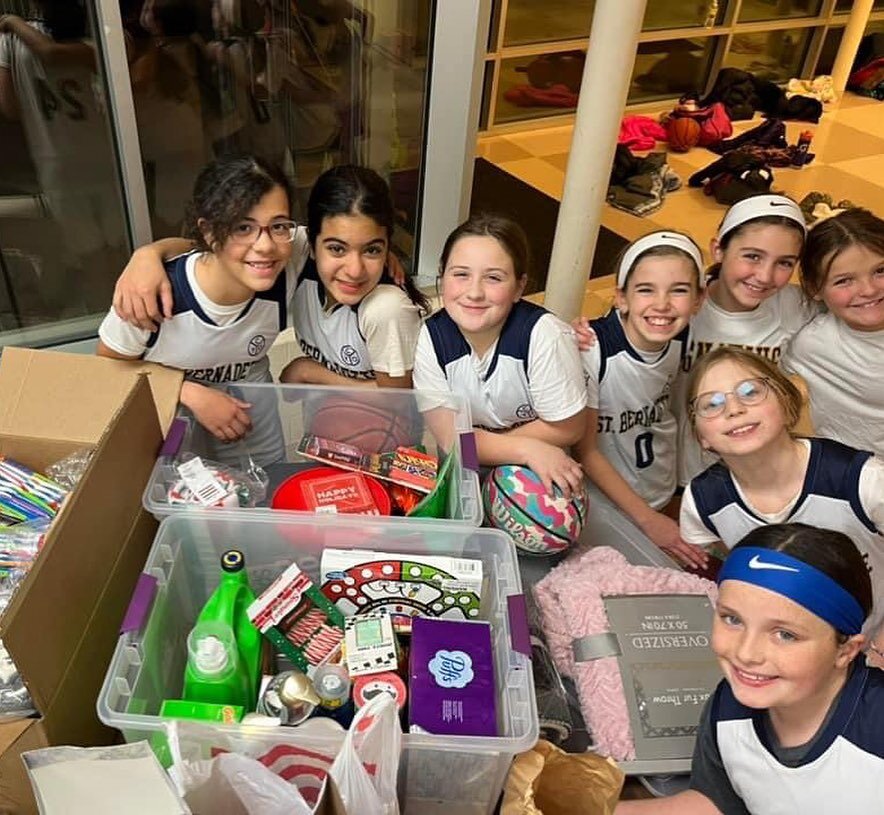 Our CYO teams are really embracing the spirit of Christmas for the CAKE Club project! Thanks Katie Cousineau and Mollie Chambers for filling a basket for Neighborhood Alliance with their 5th grade girls &amp; Bridget Gorman, Brian Wathey, John Latkow