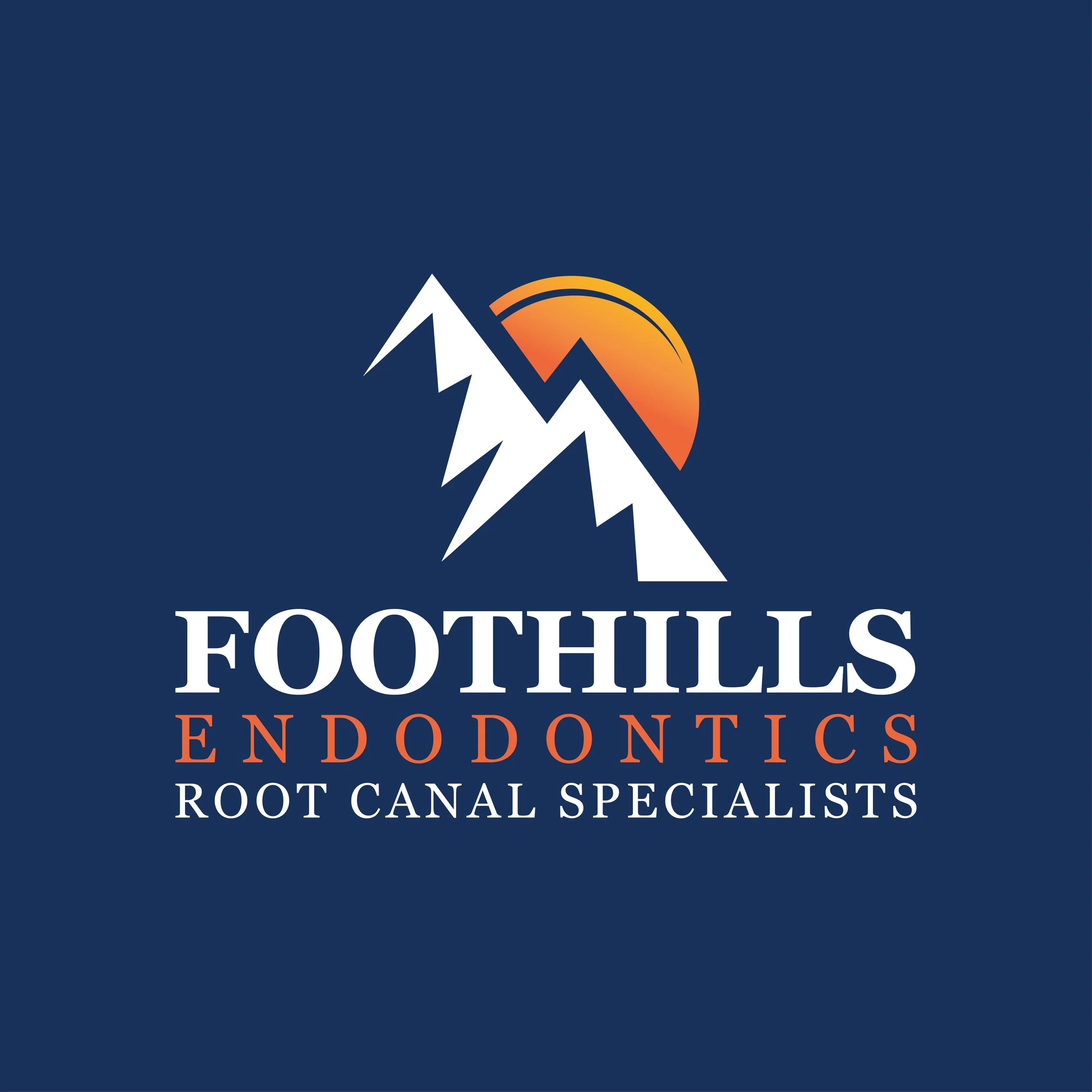 Logo for FootHills Endodontics, Root Canal Specialists featuring stylized white mountain peaks, an orange setting sun, and the practice name in white and orange text on a dark blue background.