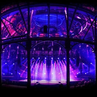 Circular stage with purple lighting. TRANS VOICES performed at the Roundhouse Dorfman Hub and carried out a screening of our documentary, "Reclaim". Part of the Beyond + Between programme running alongside Jean Paul Gaultier's Fashion Freak Show.