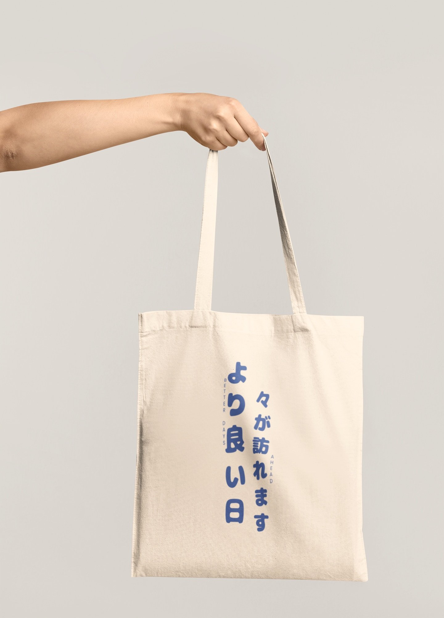 mockup-of-an-arm-holding-a-tote-bag-in-front-of-a-colored-backdrop-41541-r-el2.jpg