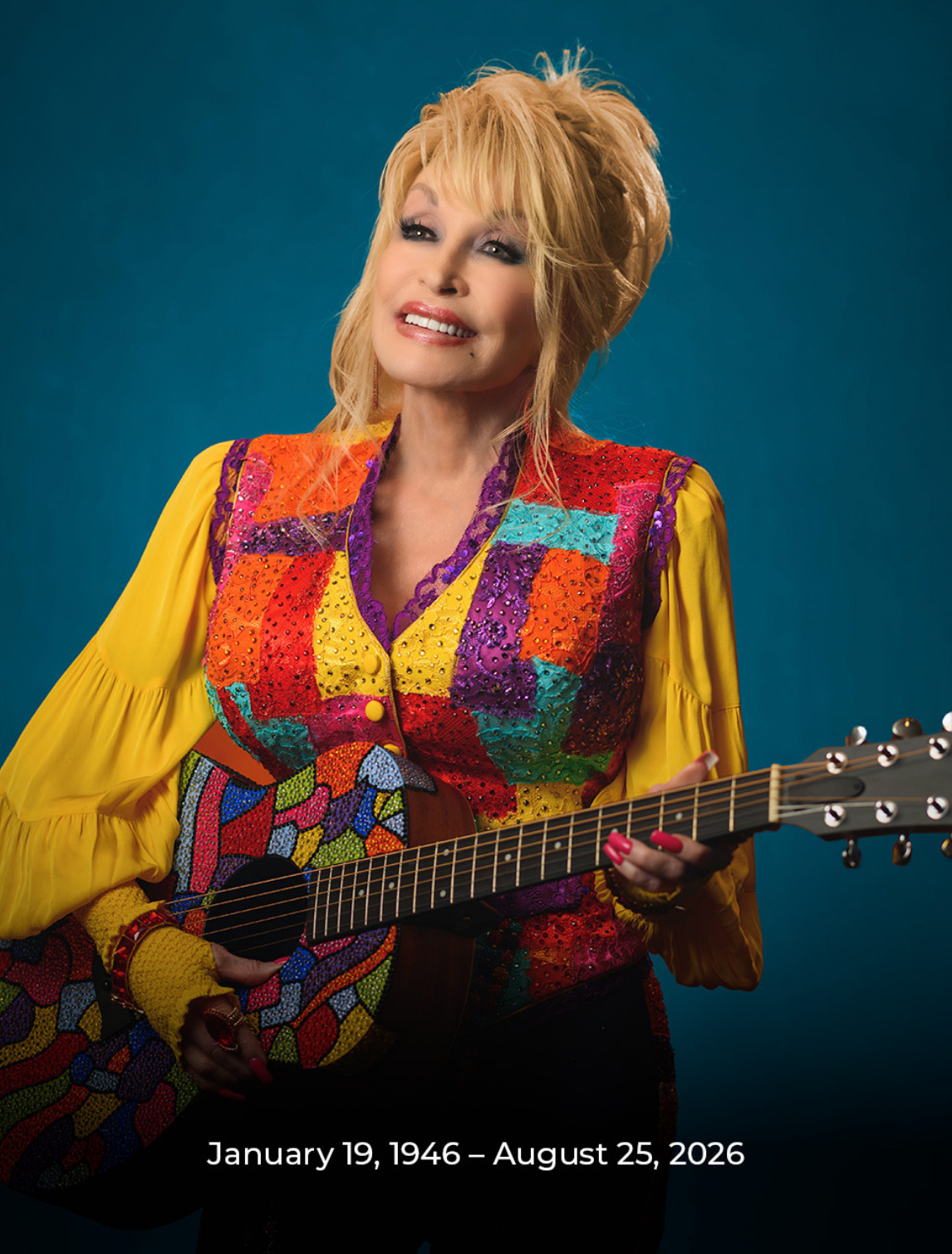 Dolly Parton in Coat of Many Colors costume