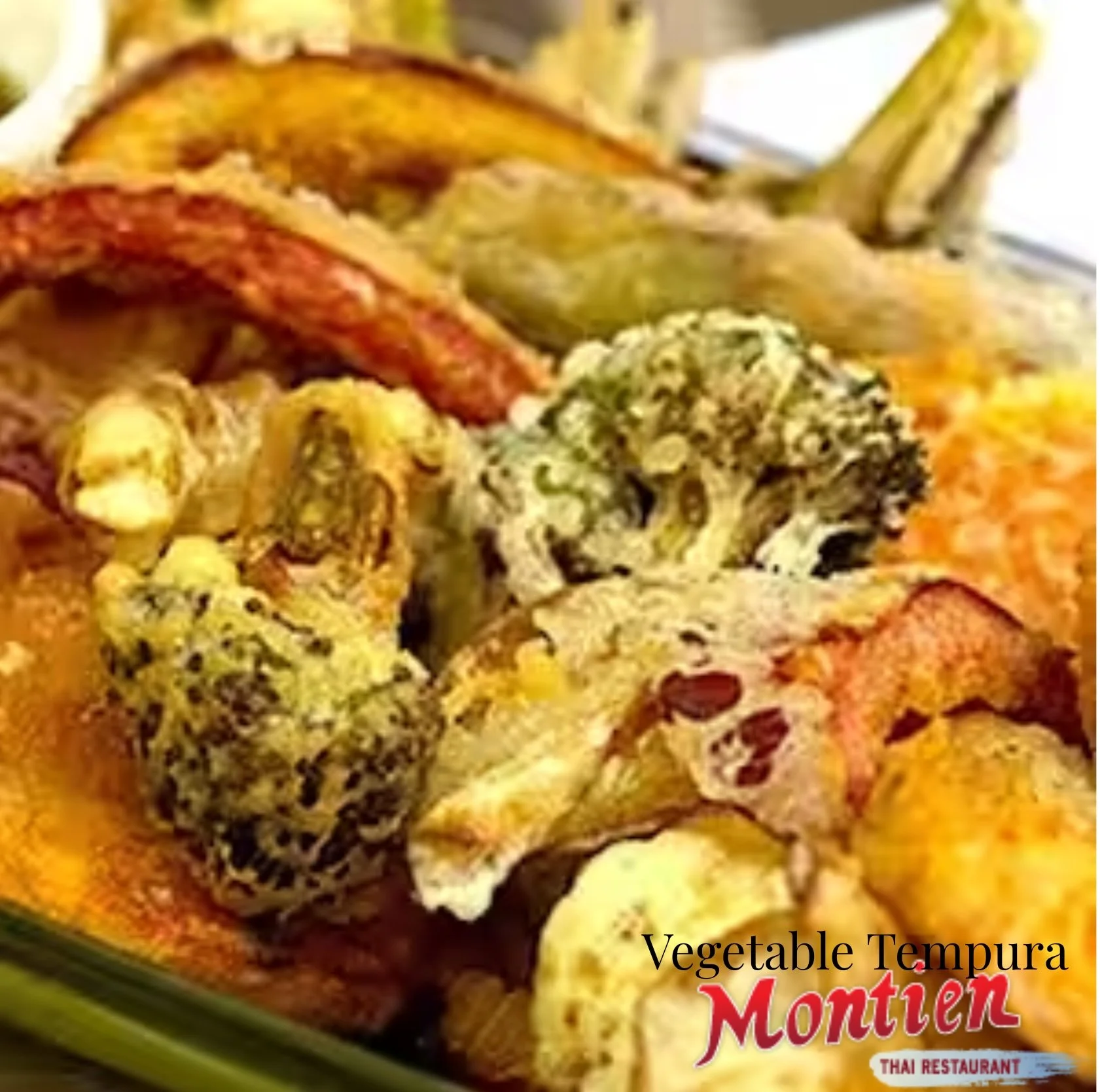 Vegetable Tempura, Montien Thai Boston, Batter-fried mixed vegetable in tempura style served with peanut sauce. 
