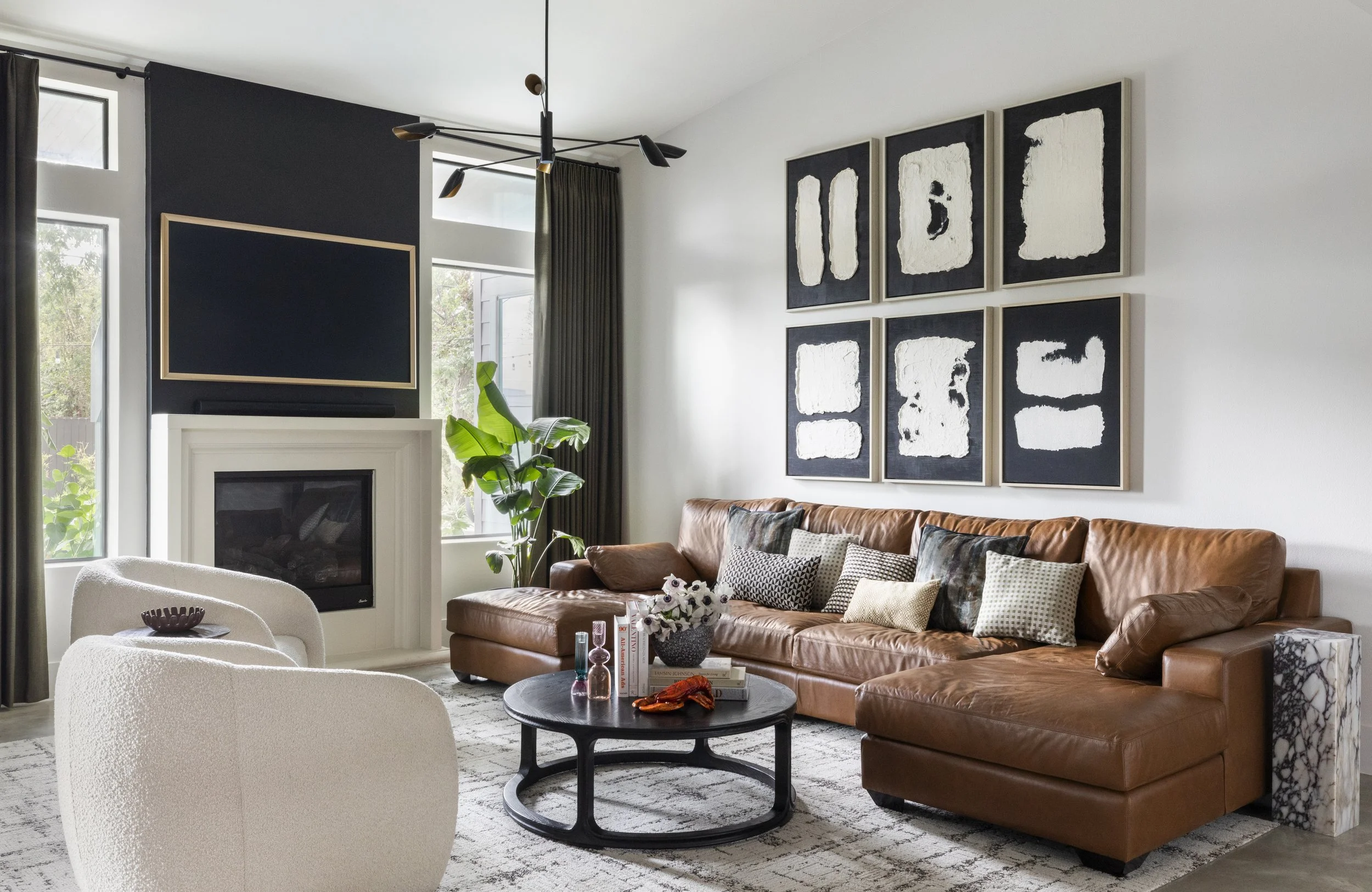 Cozy living room with oversized brown leather sofa
