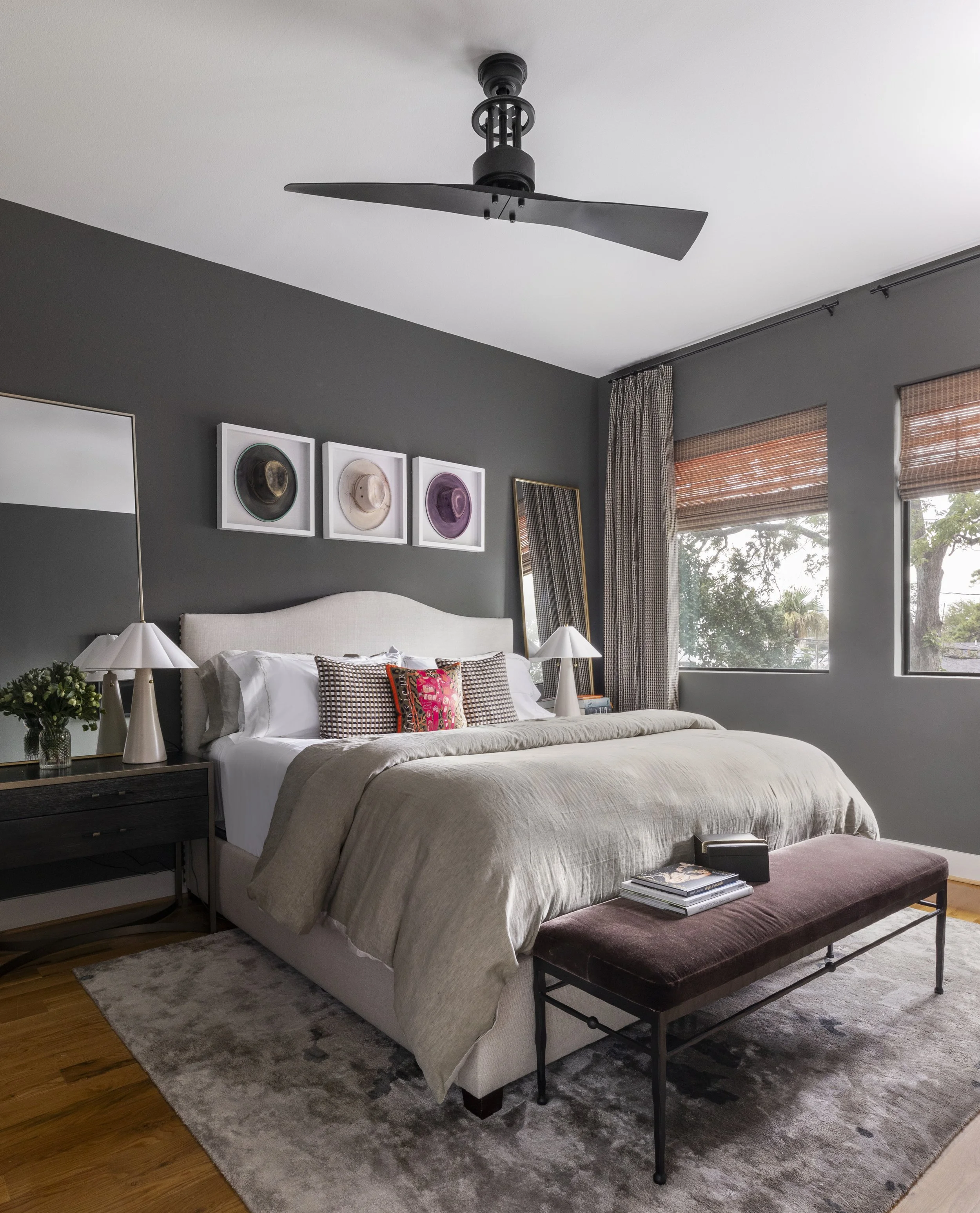 Cozy guest bedroom with army green walls and Hermes Pillow