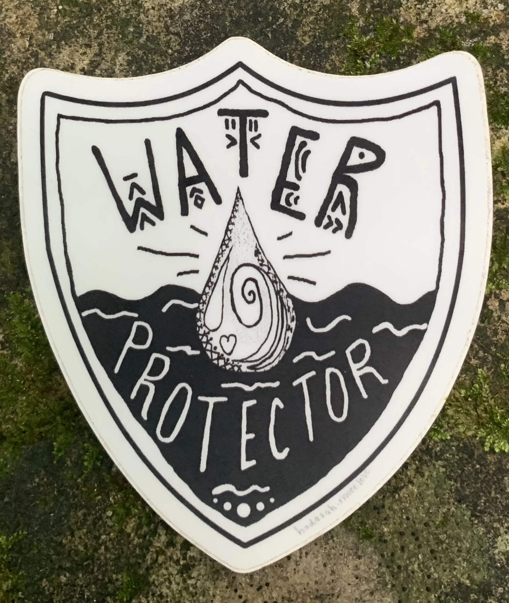 badge of the water protector