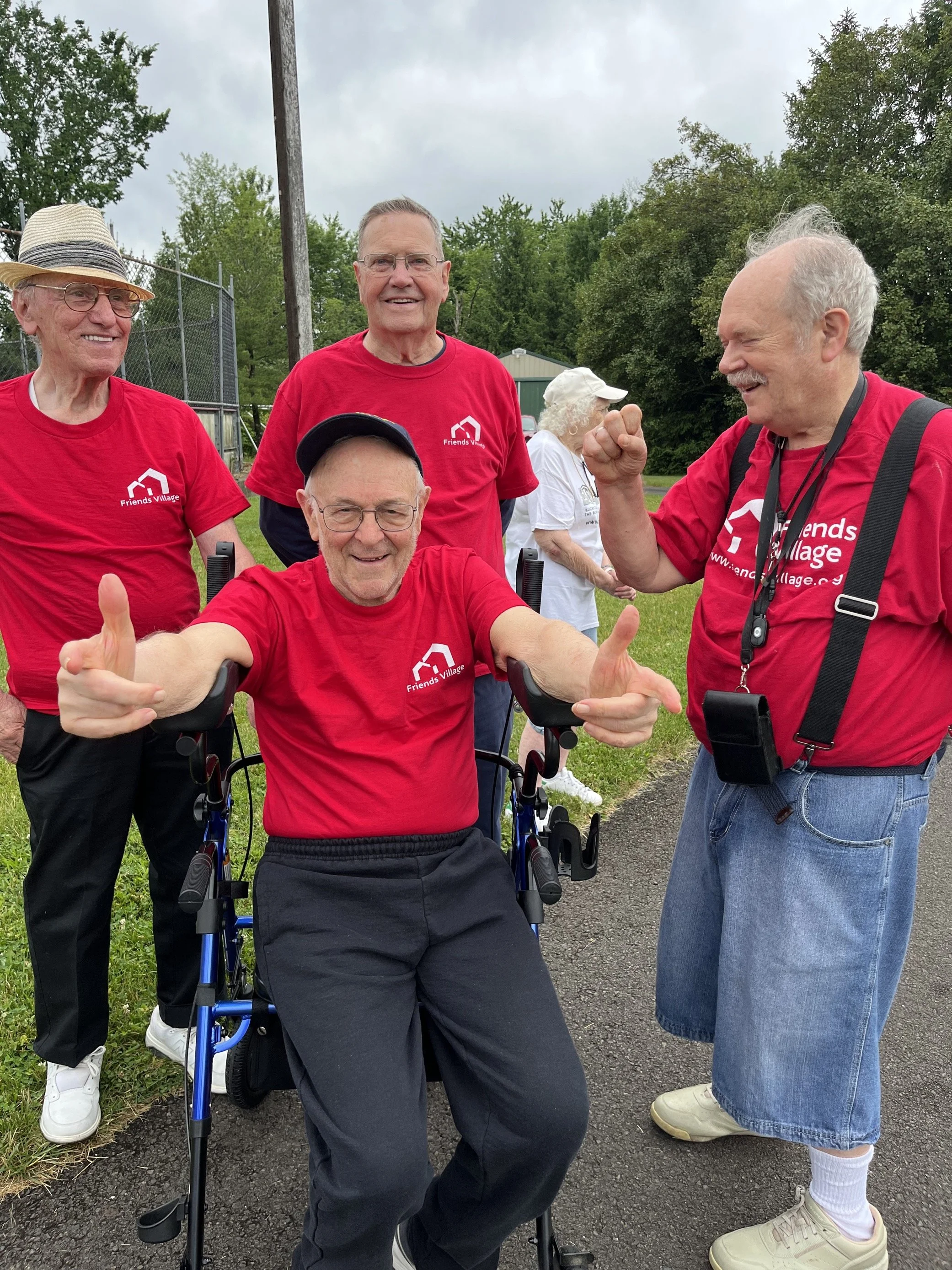 Friends Village residents participating in an outdoor community activity in Newtown, PA