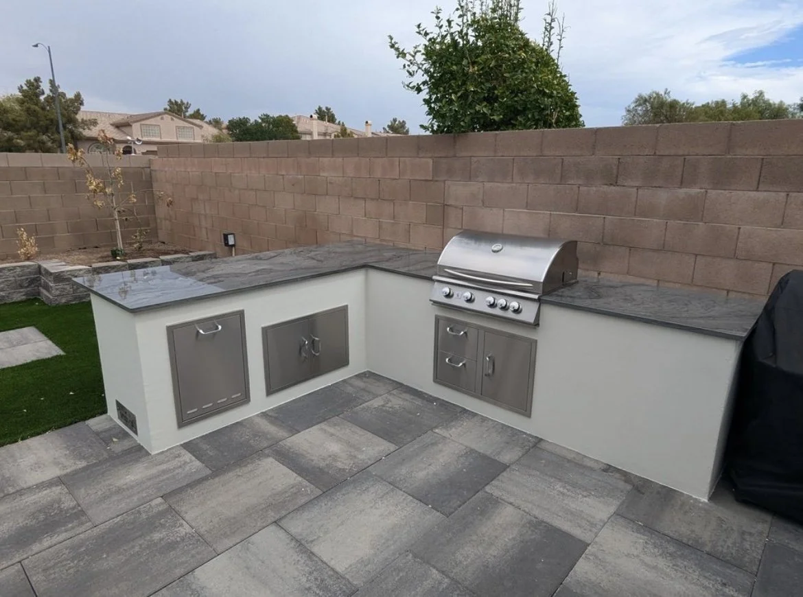 Outdoor kitchen with built-in grill and counter space