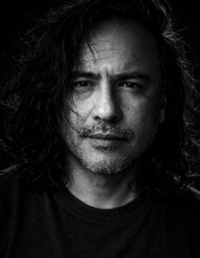 Stylized headshot of Jesús Daniel Hernández in black and white