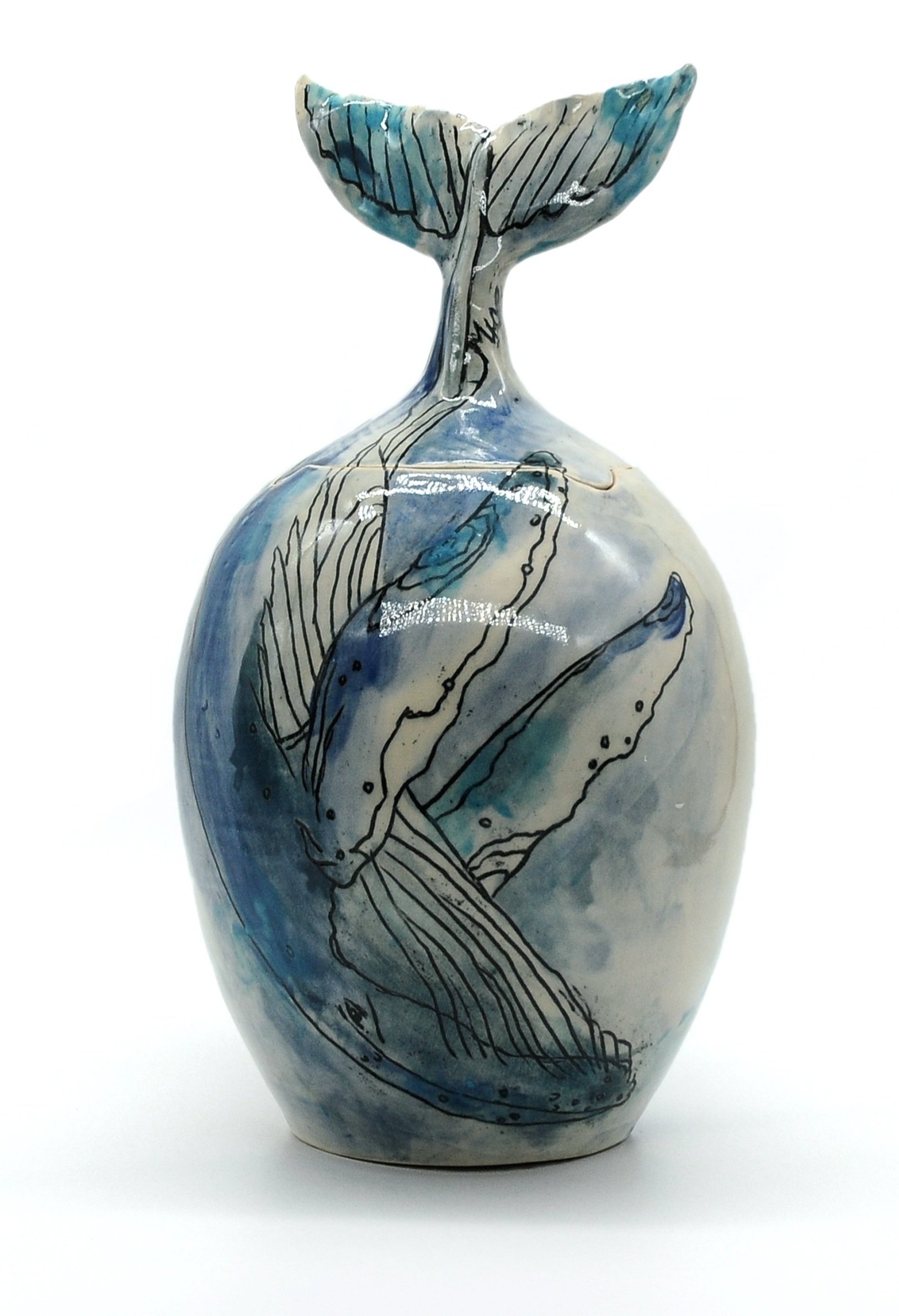 Ceramic vase with blue whale tail design
