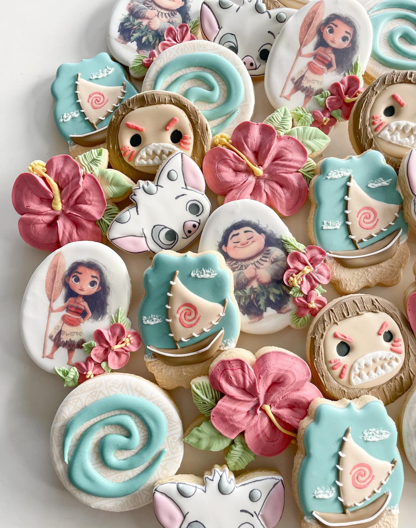 Moana cookies for some special visitors to our island🏝️ 🌺
.
.
.#moanacookies #disneycookies #sugarcookies #charactercookies #printedcookies #floralcookies #hawaiicookies #oceancookies