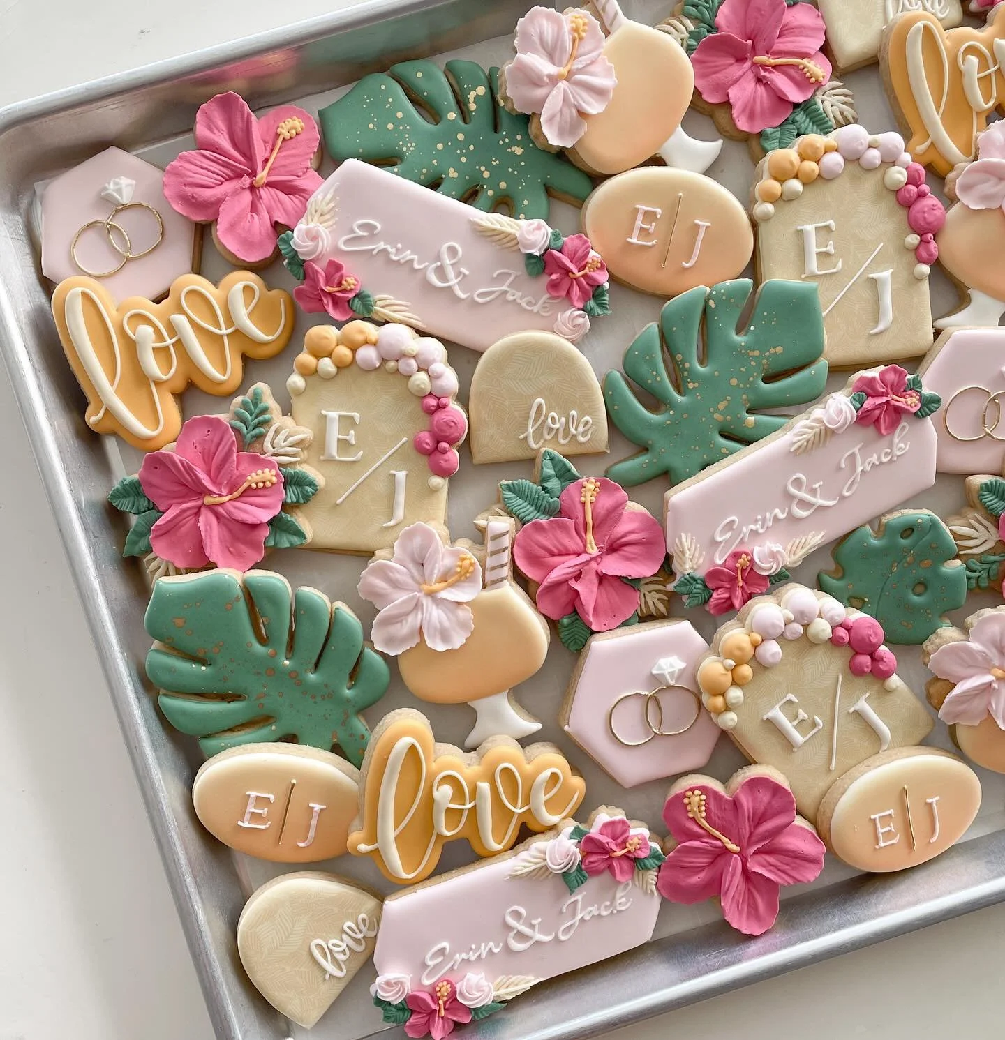 Dreamy cookies for Erin &amp; Jack&rsquo;s sunset Pau Hana!🍹 🌺 🌅 
.
.
.
#hawaiicookies #tropicalcookies #floralcookies #weddingcookies #hawaiiwedding #oahufoodie