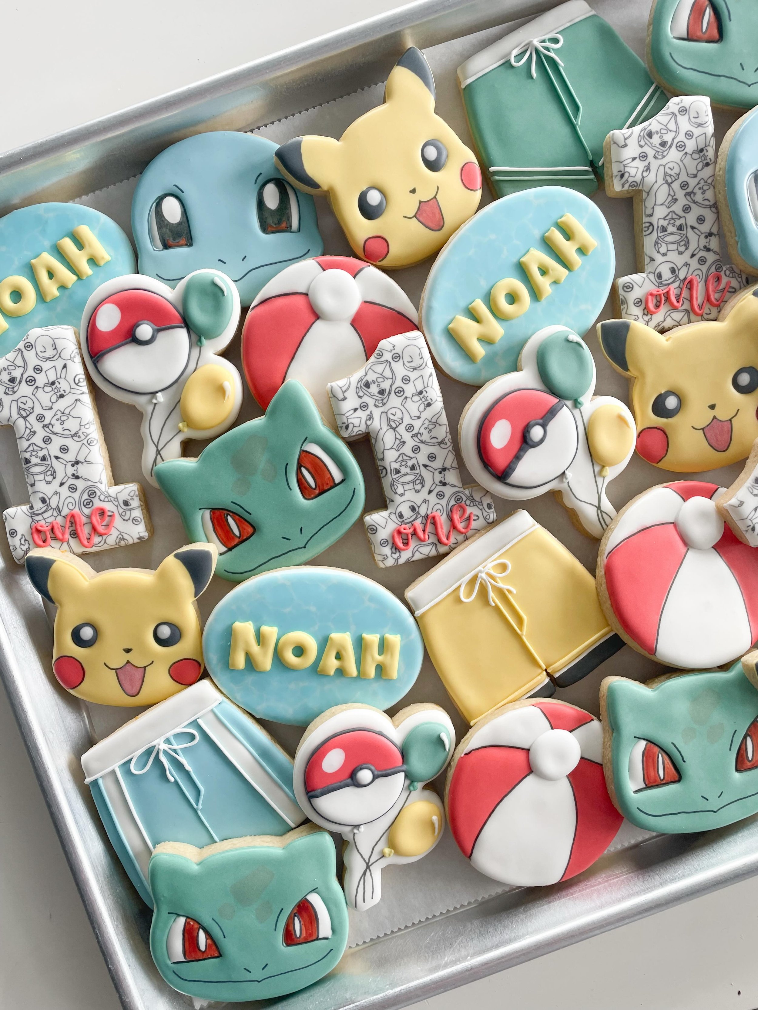 Celebrating Noah&rsquo;s first birthday with a Pok&eacute;mon Pool Party! 🎈 🩳💦
.
.
.
#firstbirthdaycookies #pokemoncookies #poolpartycookies #oahuparty #birthdaycookies