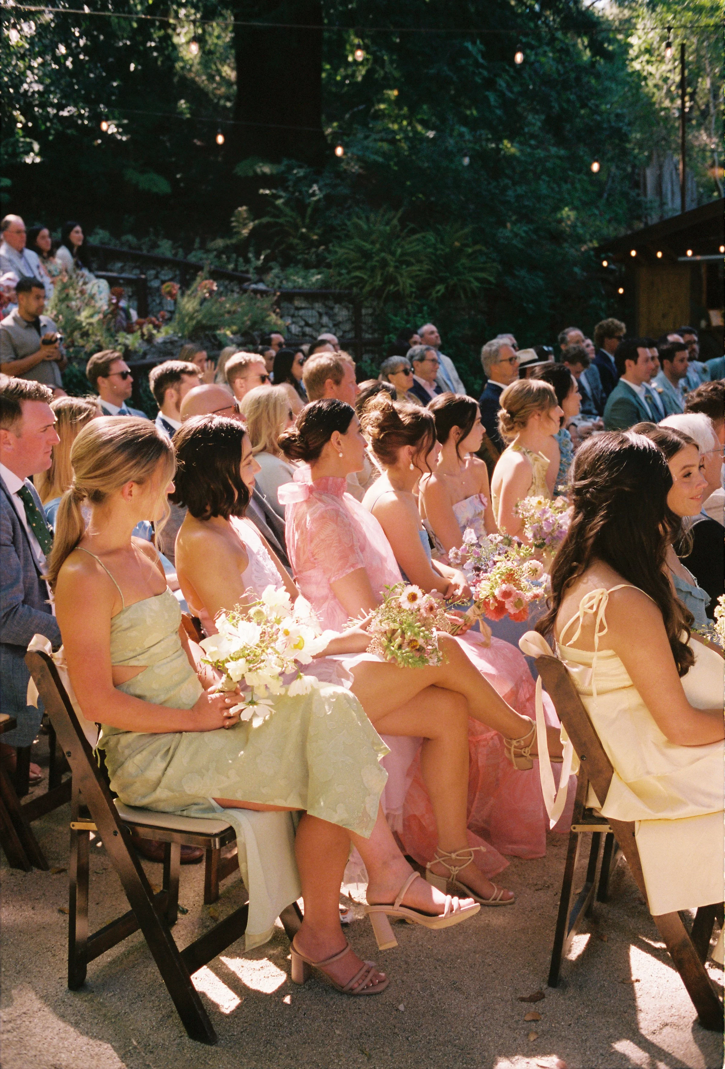 bridesmaids with their bouquets at ceremony 