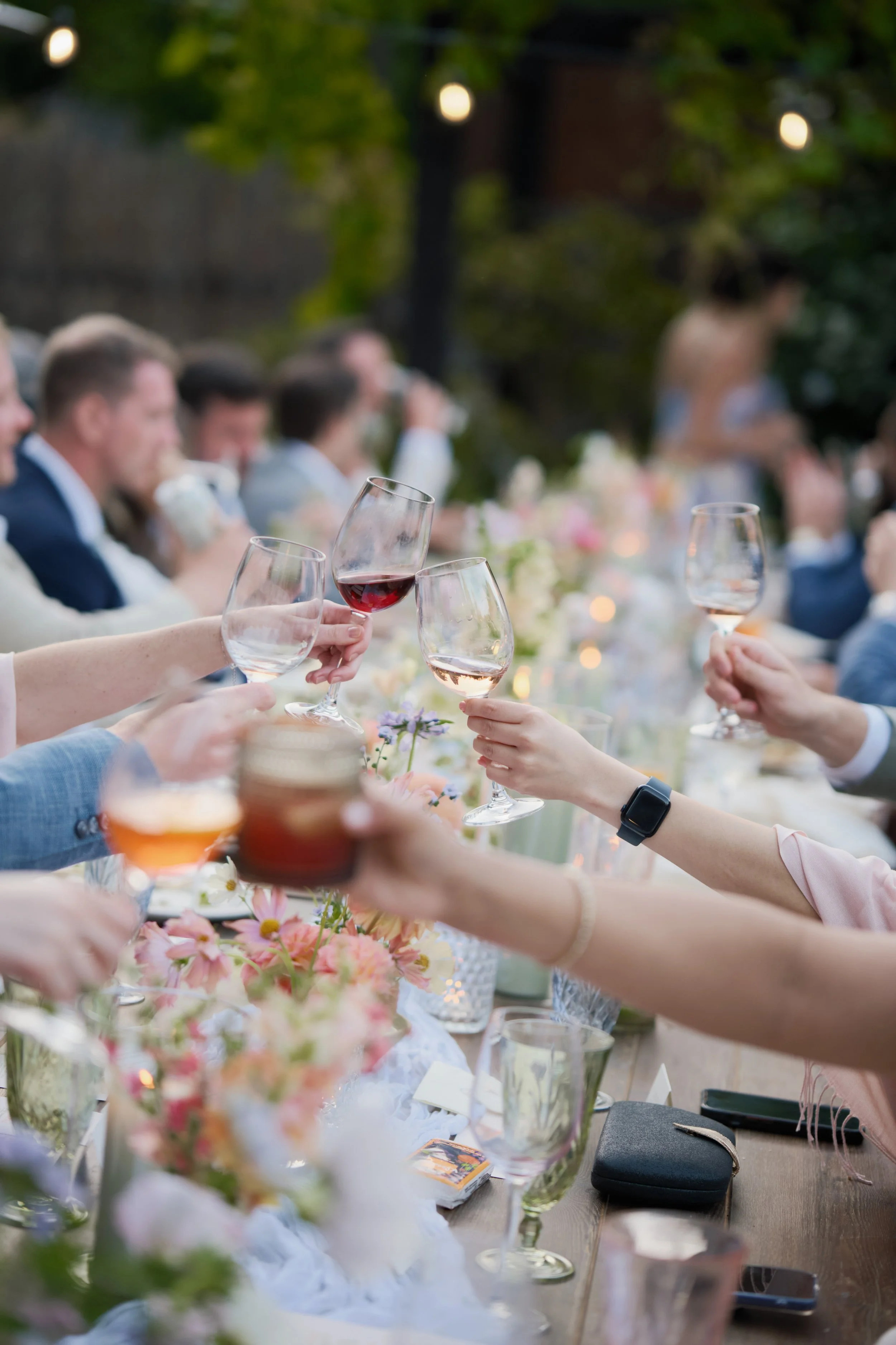 reception table toasting in an intimate gathering