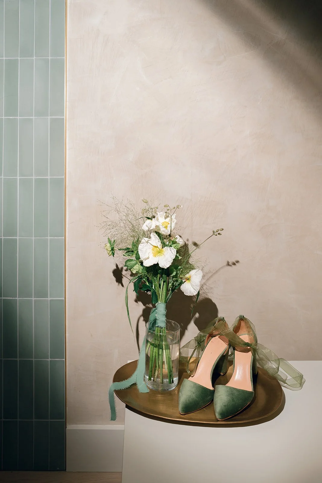 modern bridal bouquet with poppies and bride's heels