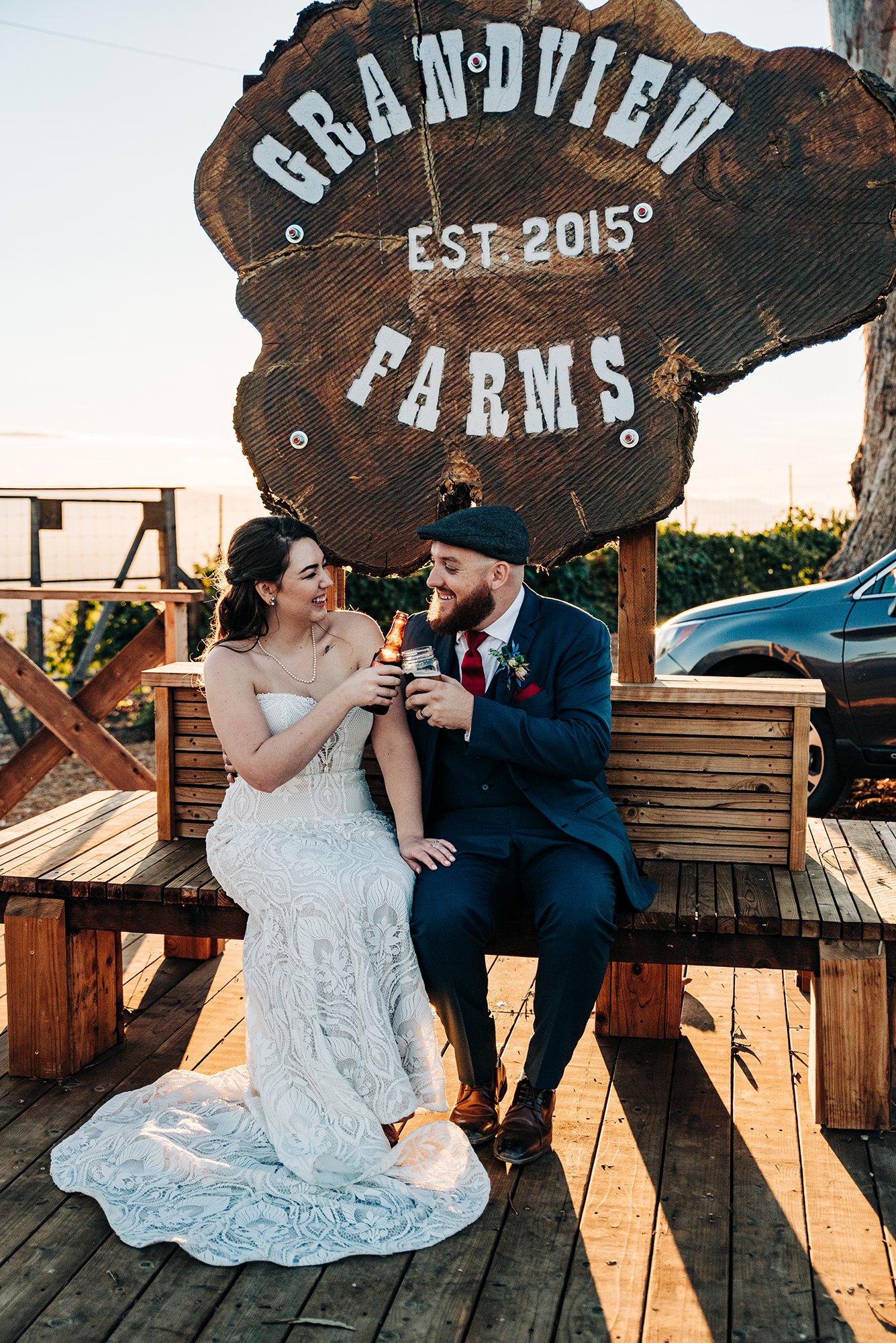 A newly married couple cheers with beers at their San Jose venue.