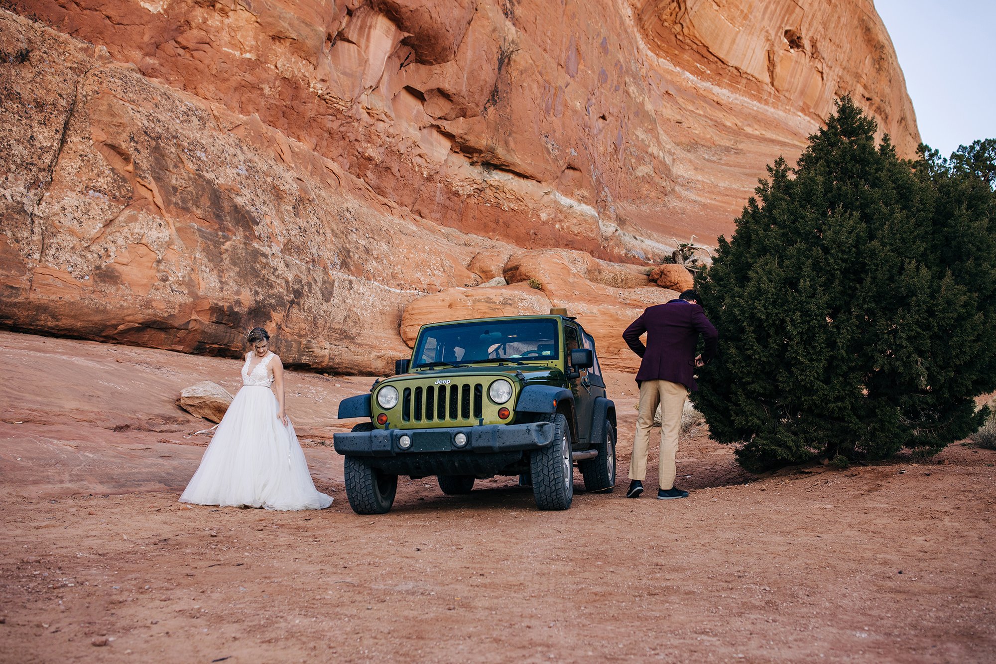 Jill and Drew get ready for a first look during their elopement in Moab, Utah.