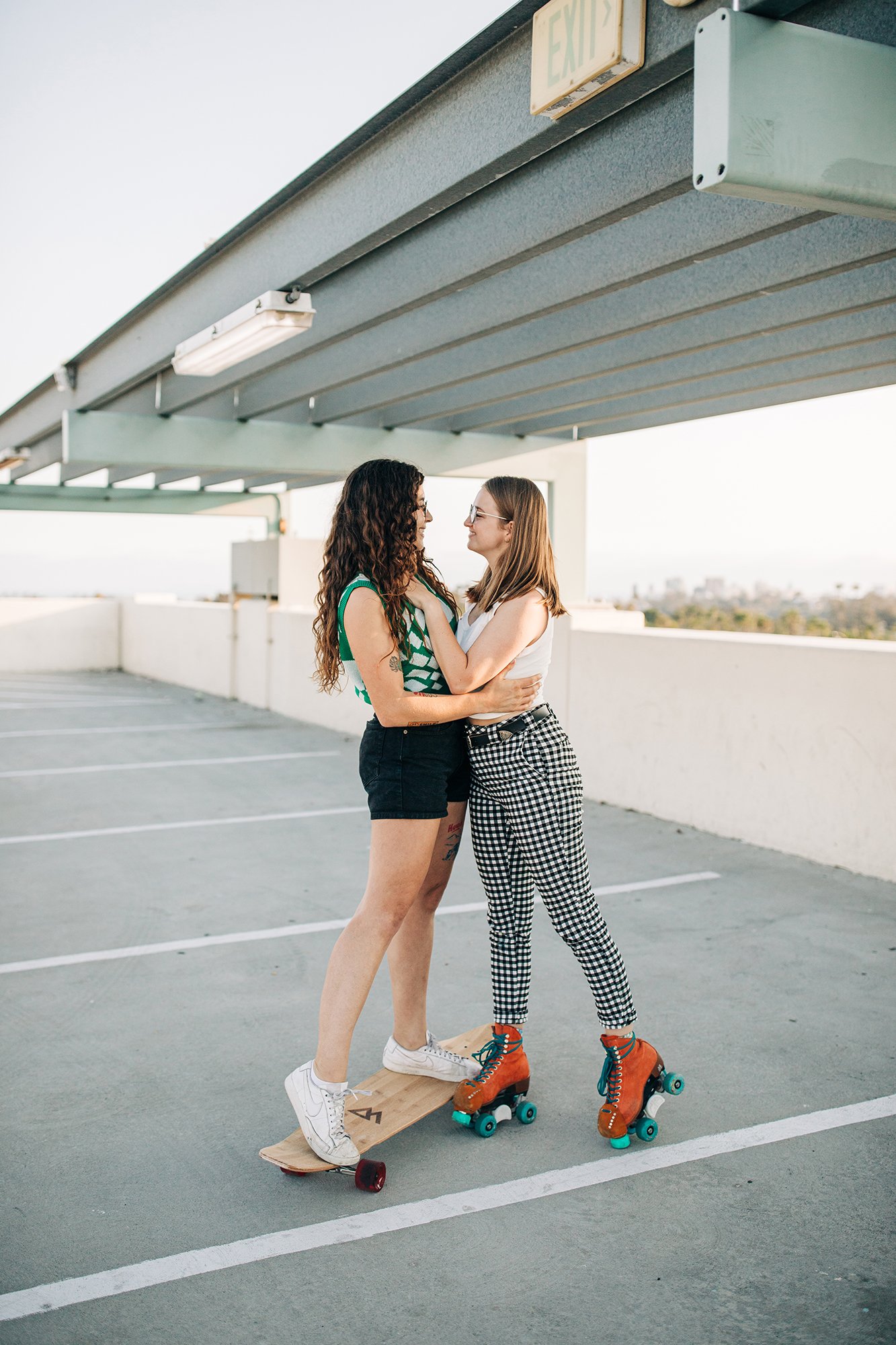 Clarisse and Steph skate together for a couple's photoshoot.