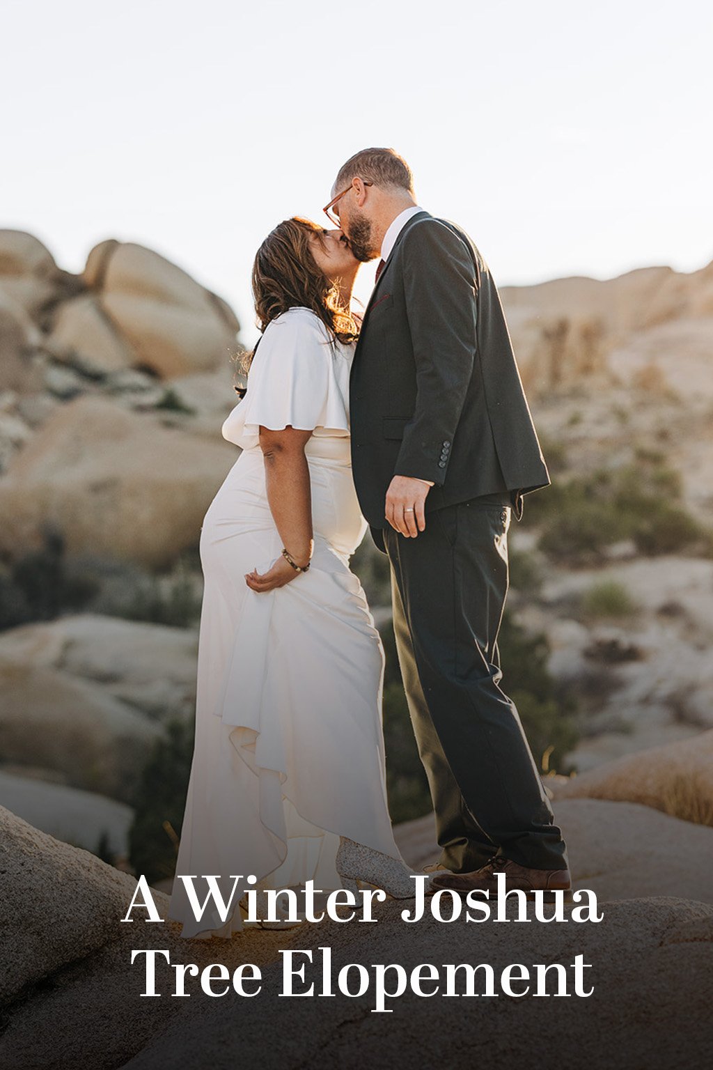 A married couple kisses in Joshua Tree with text reading "A Winter Joshua Tree Elopement".