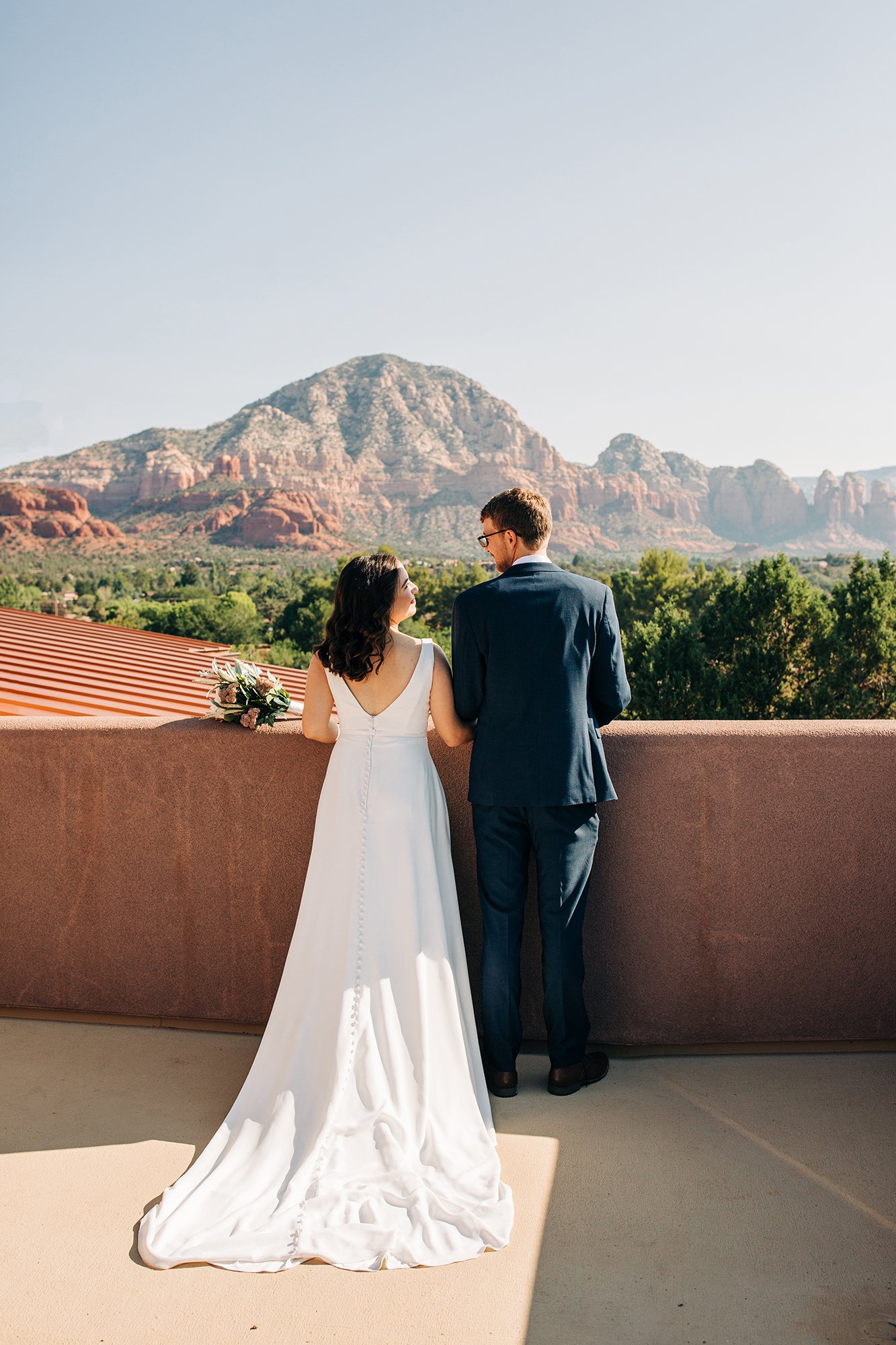 Stephanie and Matthew take in the mountain views of Sedona during their elopement wedding