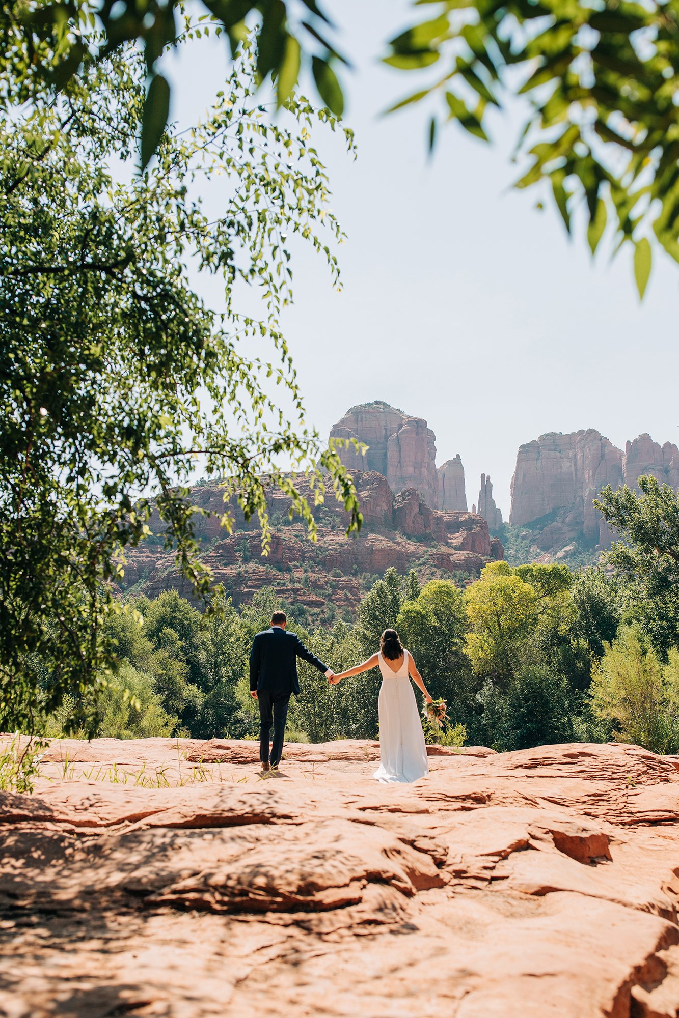 Stephanie and Matthew take in the Sedona view with awe during in this elopement photo