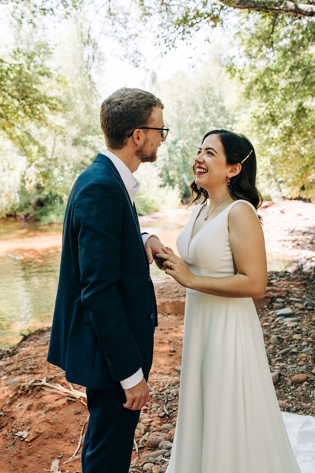 A close-up photo of Steph smiling at her groom, Matt, during her Sedona wedding day