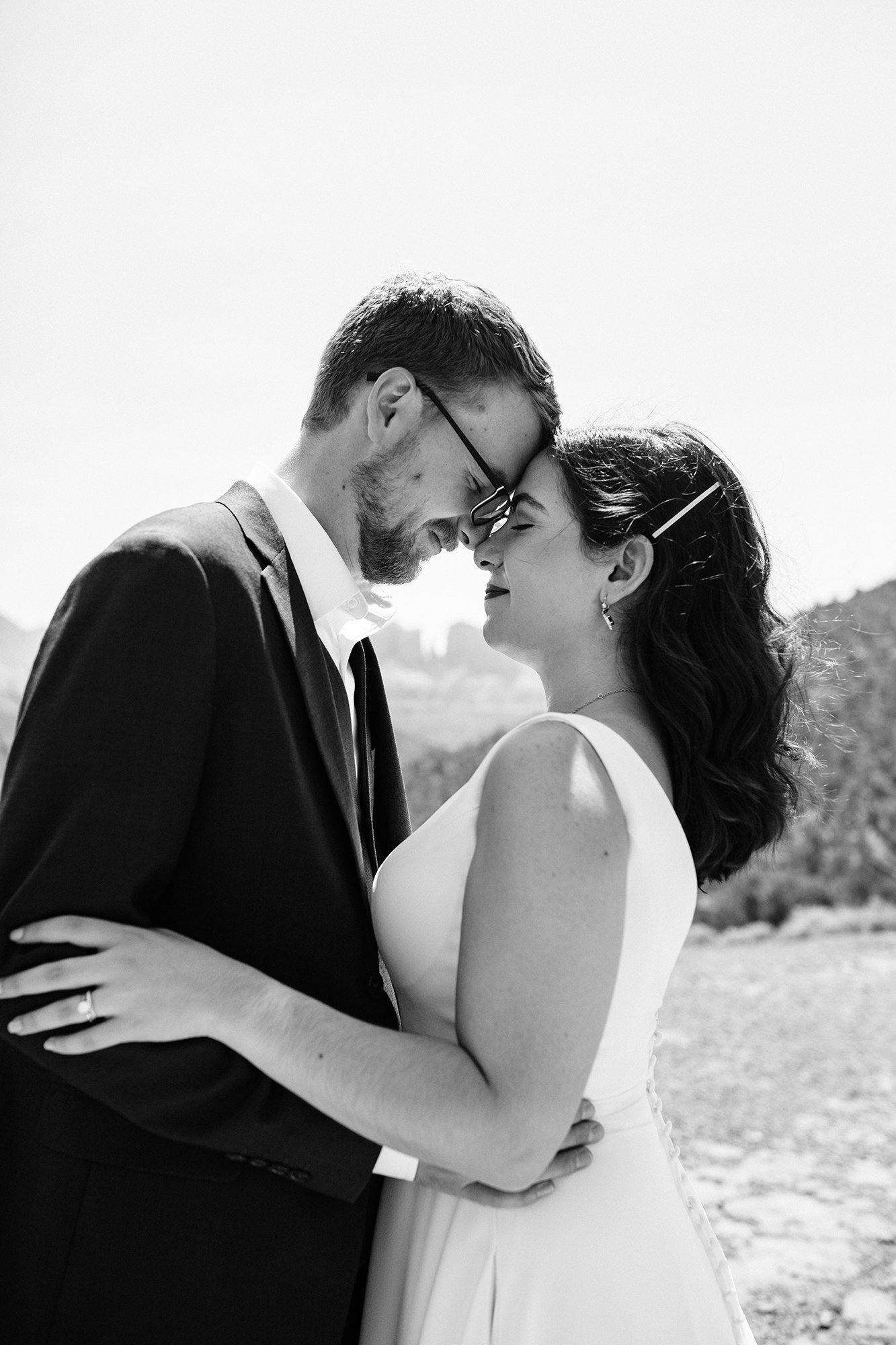 Nose to nose, our wedding couple, Steph and Matt, take in the joy of getting married in Sedona Arizona