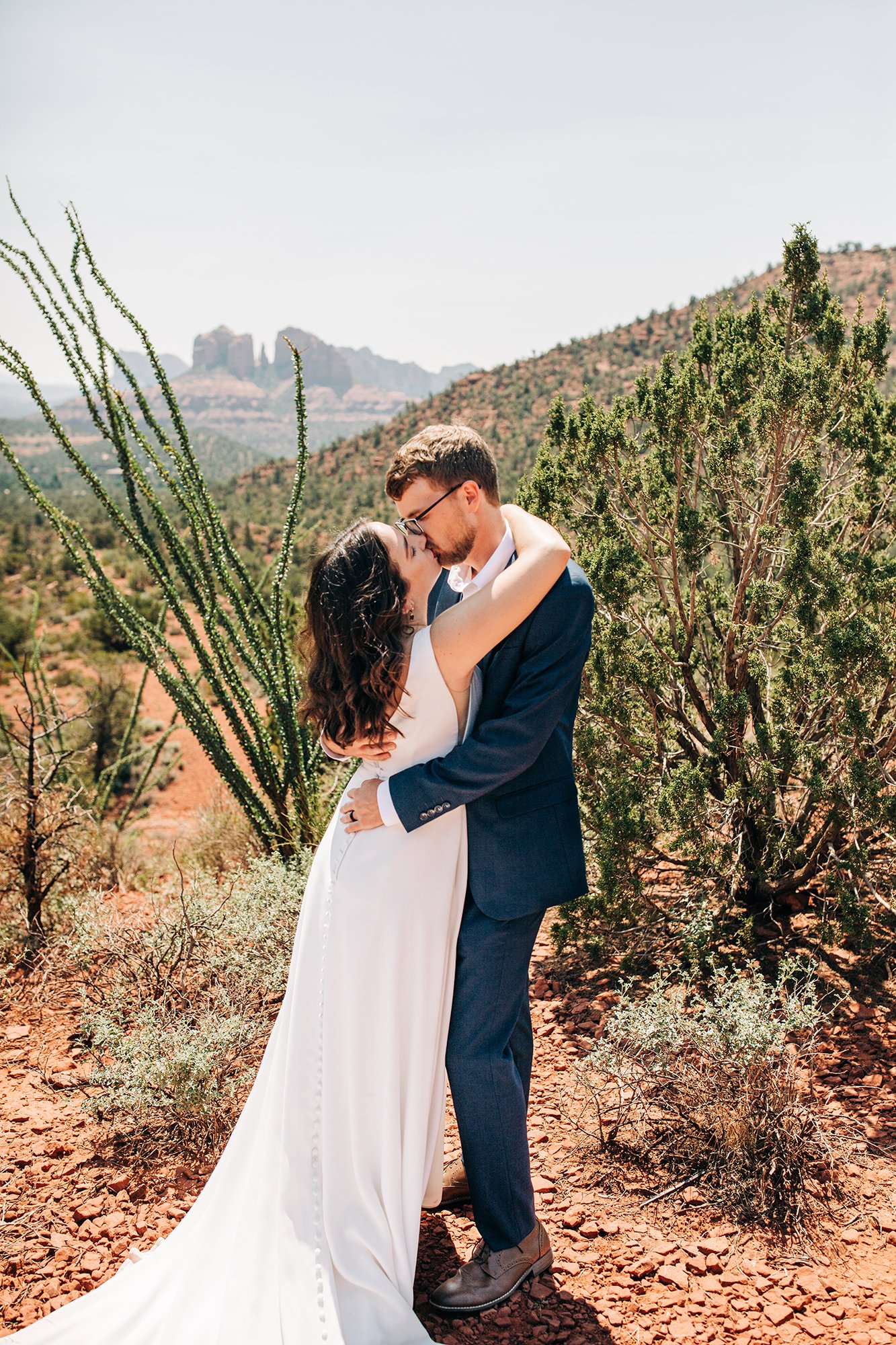 Newly weds Stephanie and Matt give each other a big kiss after their Sedona elopement