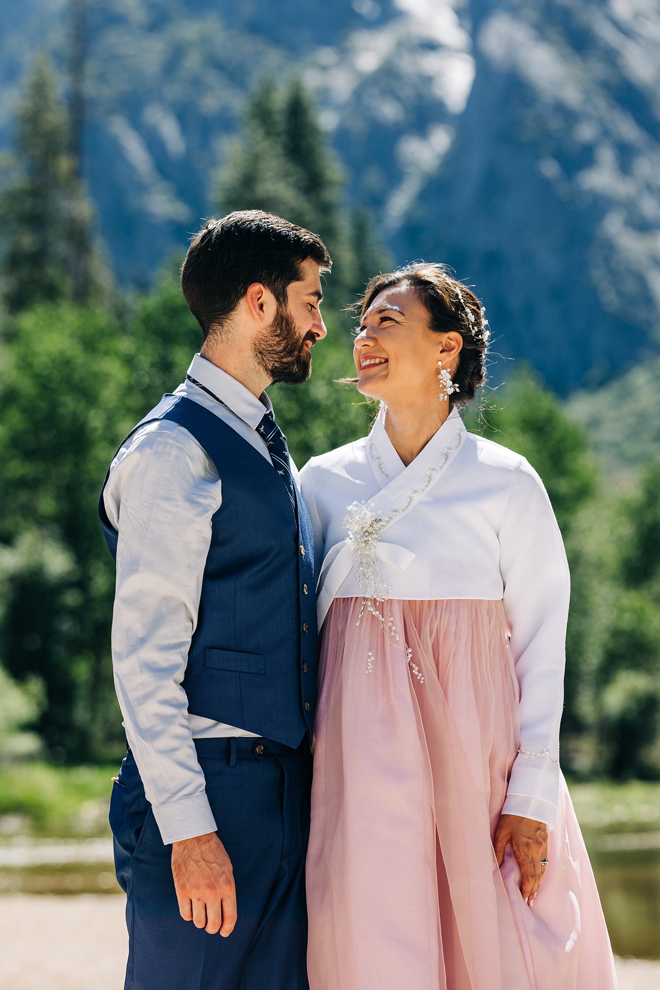 Yooree and Jarrod lock eyes during their elopement in Yosemite National Park, California.