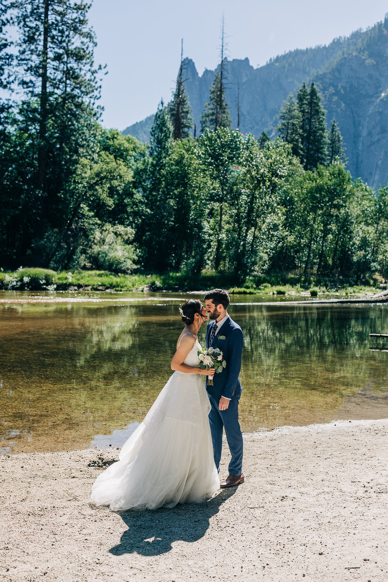 Yooree and Jarrod kiss after their wedding ceremony in Yosemite National Park in California.