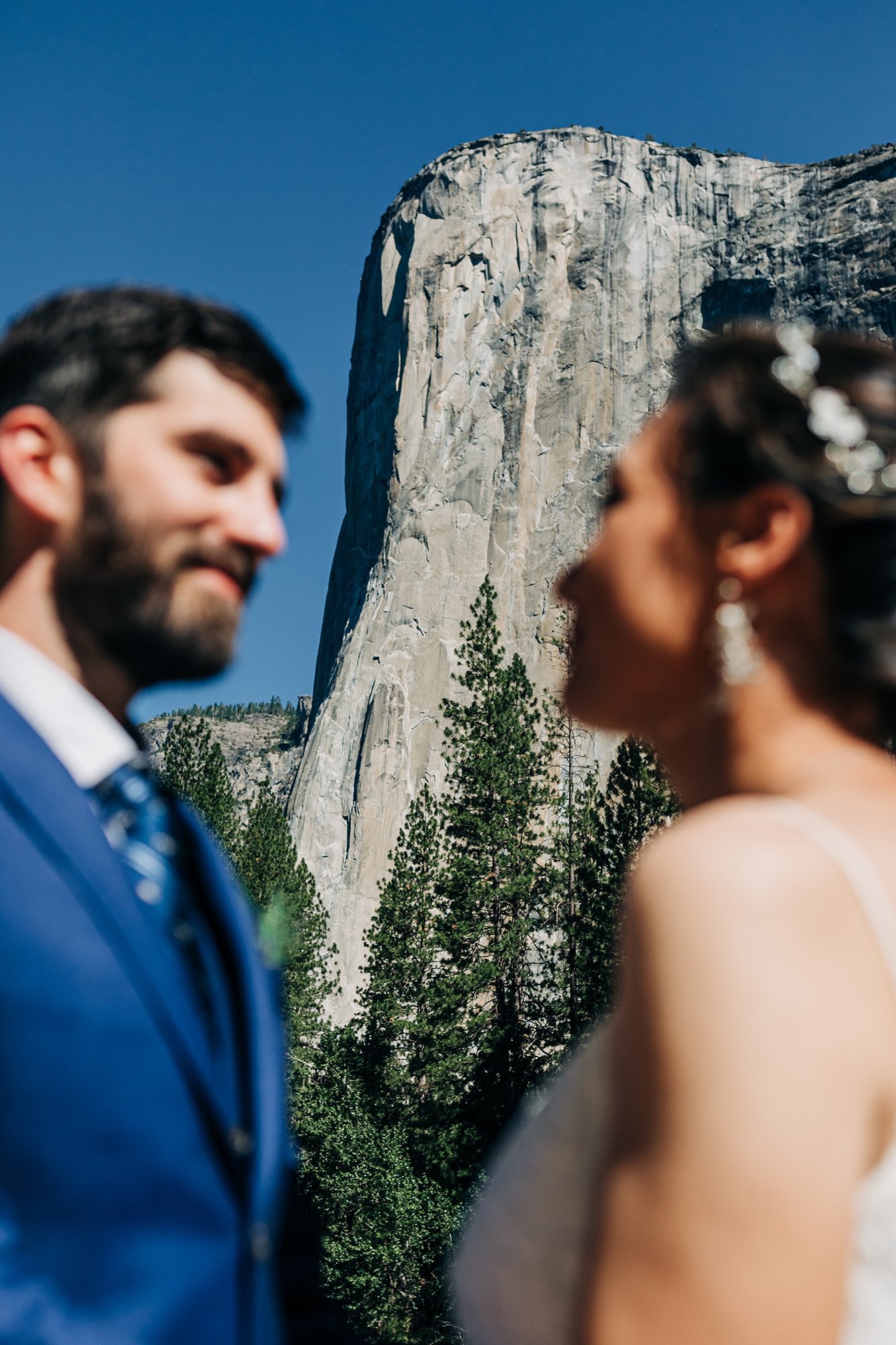 El Capitan in Yosemite is viewed through a couple.