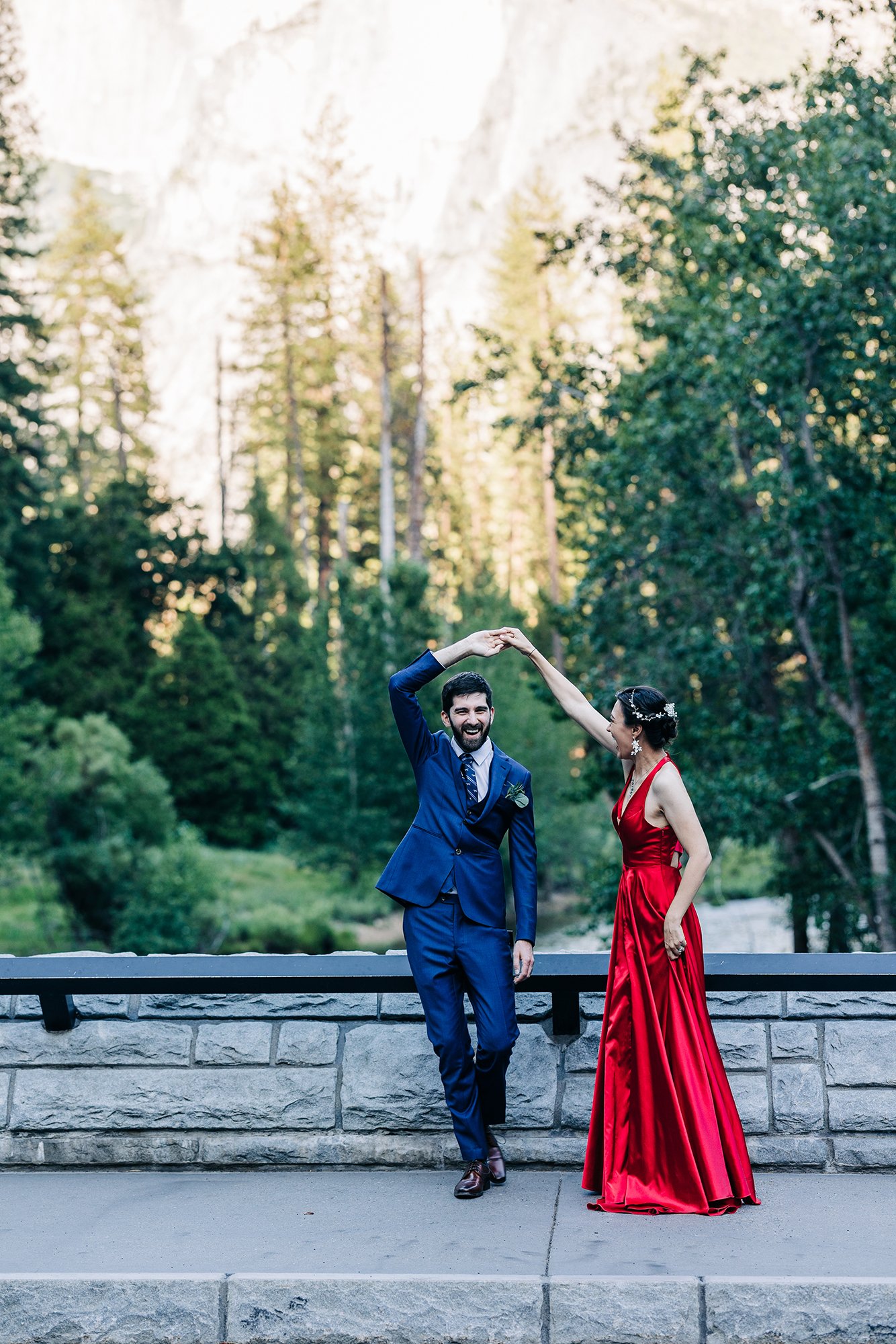 Yooree spins Jarrod during their elopement in Yosemite National Park.