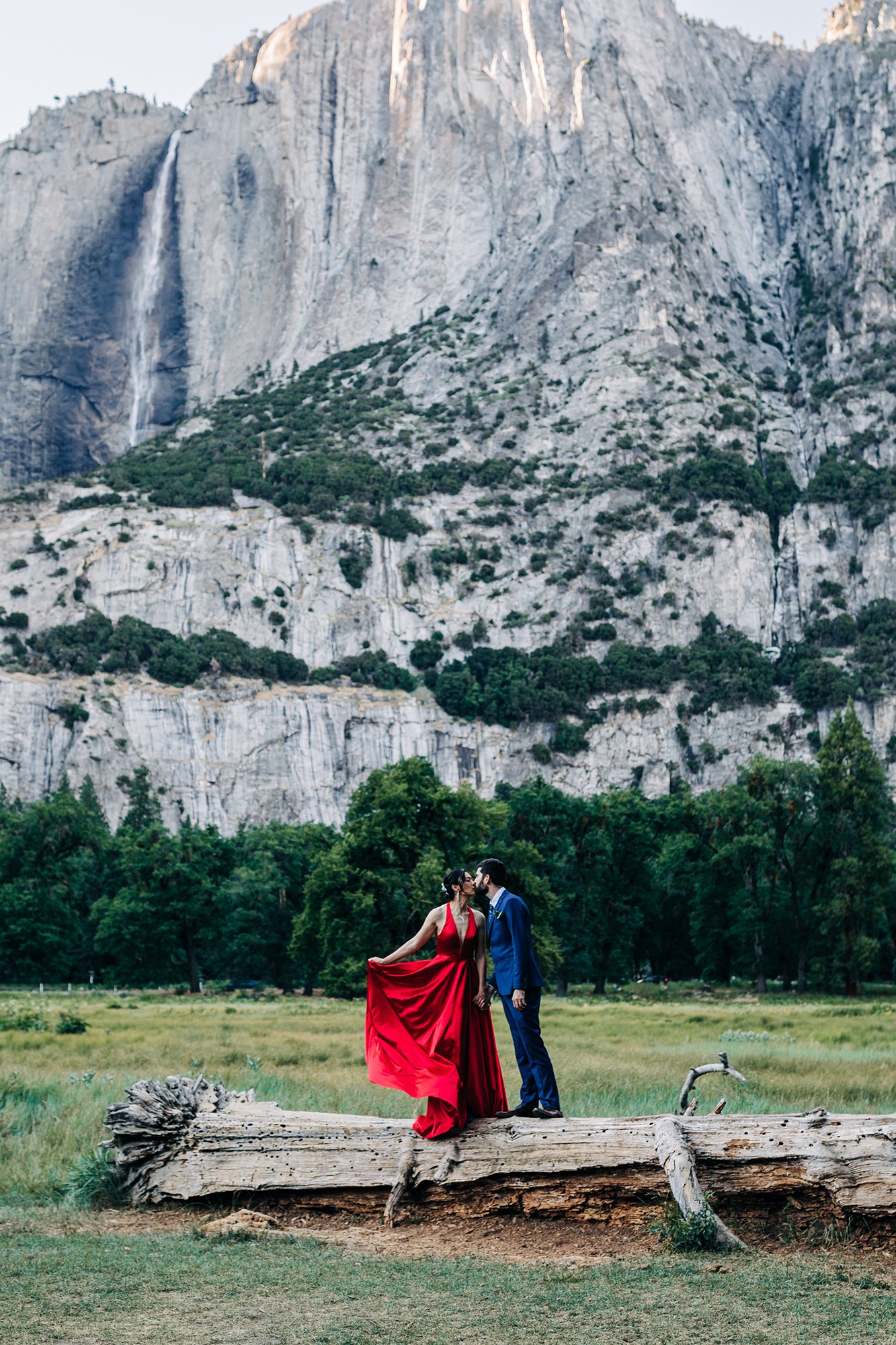 Yooree and Jarrod kiss during their elopement in Yosemite National Park.