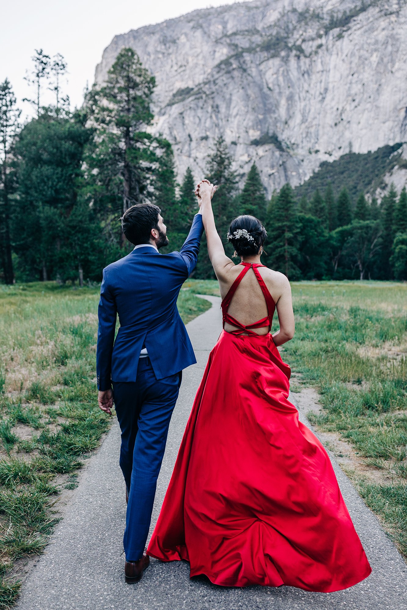 Yooree and Jarrod walk together during their elopement in Yosemite National Park.
