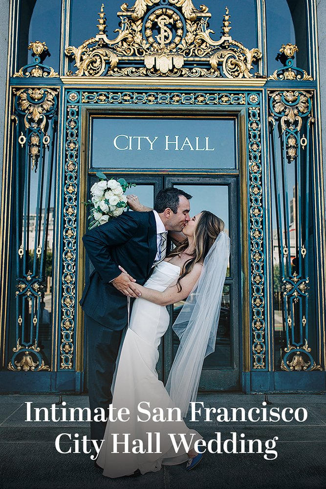 Olya and John kiss in front of San Francisco City Hall.