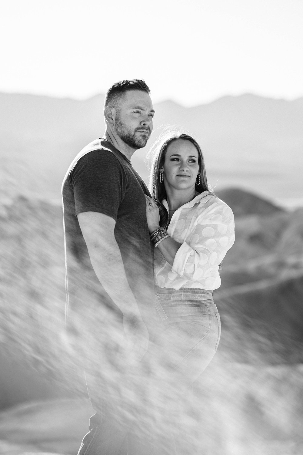 A couple poses during their engagement photography session in California.