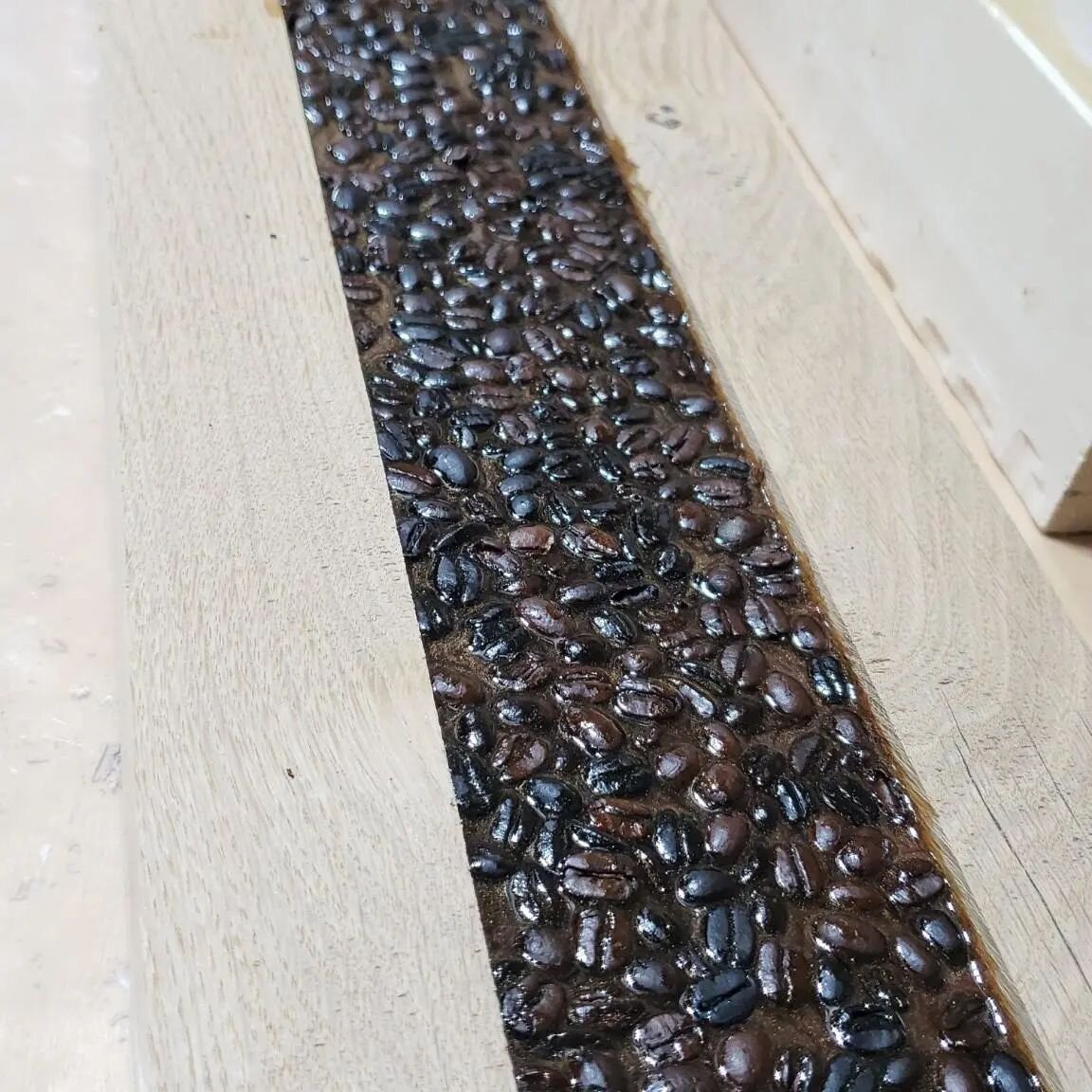 Creating a wall cap for a customer's coffee bar using local white oak, coffee beans, and resin. This will be a two-pour project to keep the surface nice and smooth. I think the copper colored resin did a good Eye of Sauron impersonation 😂 what do yo