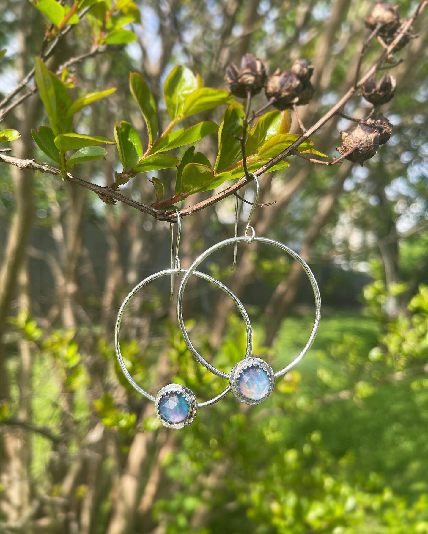 Catch me at the @berwynfarmersmarket today from 10-1! I'll have a number of one of a kind pieces with me- including this pair of hand-forged recycled sterling silver hoop earrings. They are adorned with rose-cut aurora opal and crystal doublets and a